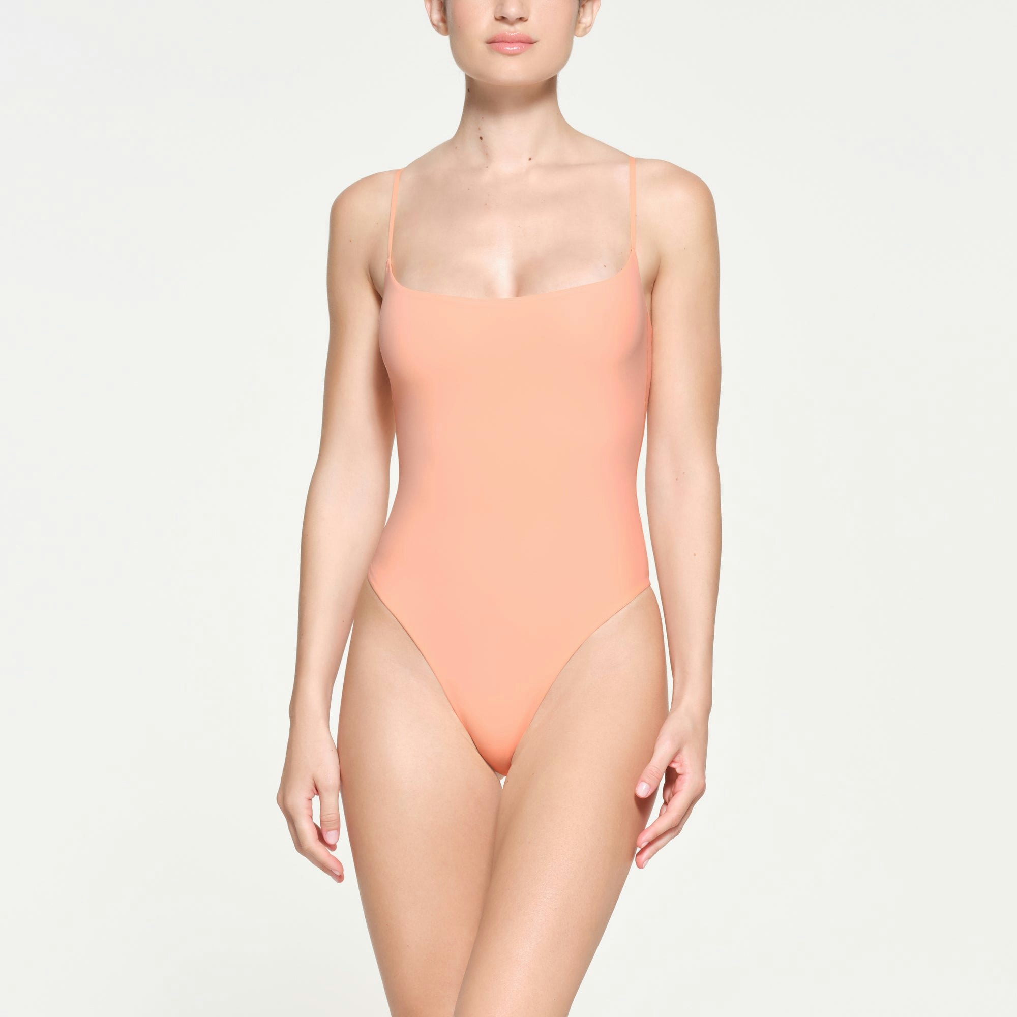 FITS EVERYBODY CAMI BODYSUIT | FADED NECTAR ON A MODEL FRONT VIEW