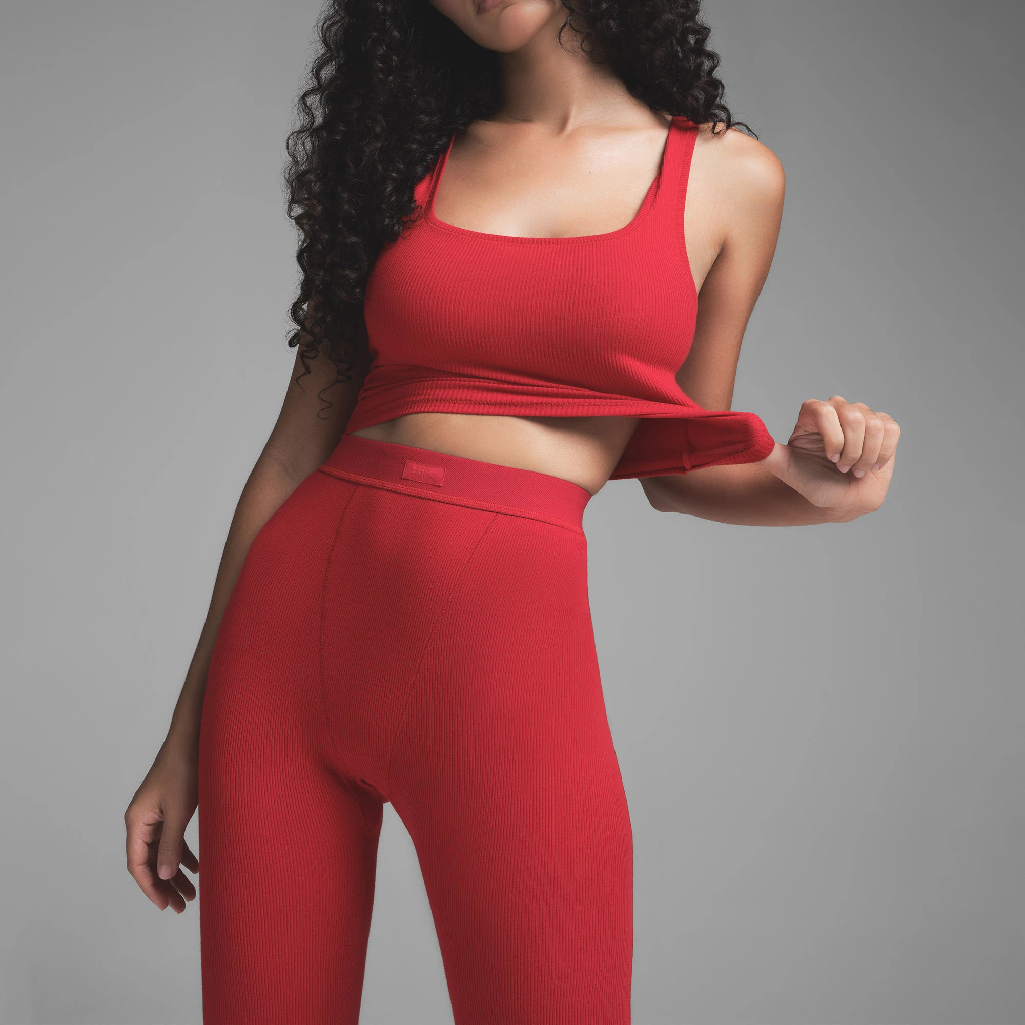 COTTON RIB LEGGING | CRANBERRY ON A MODEL SIDE VIEW