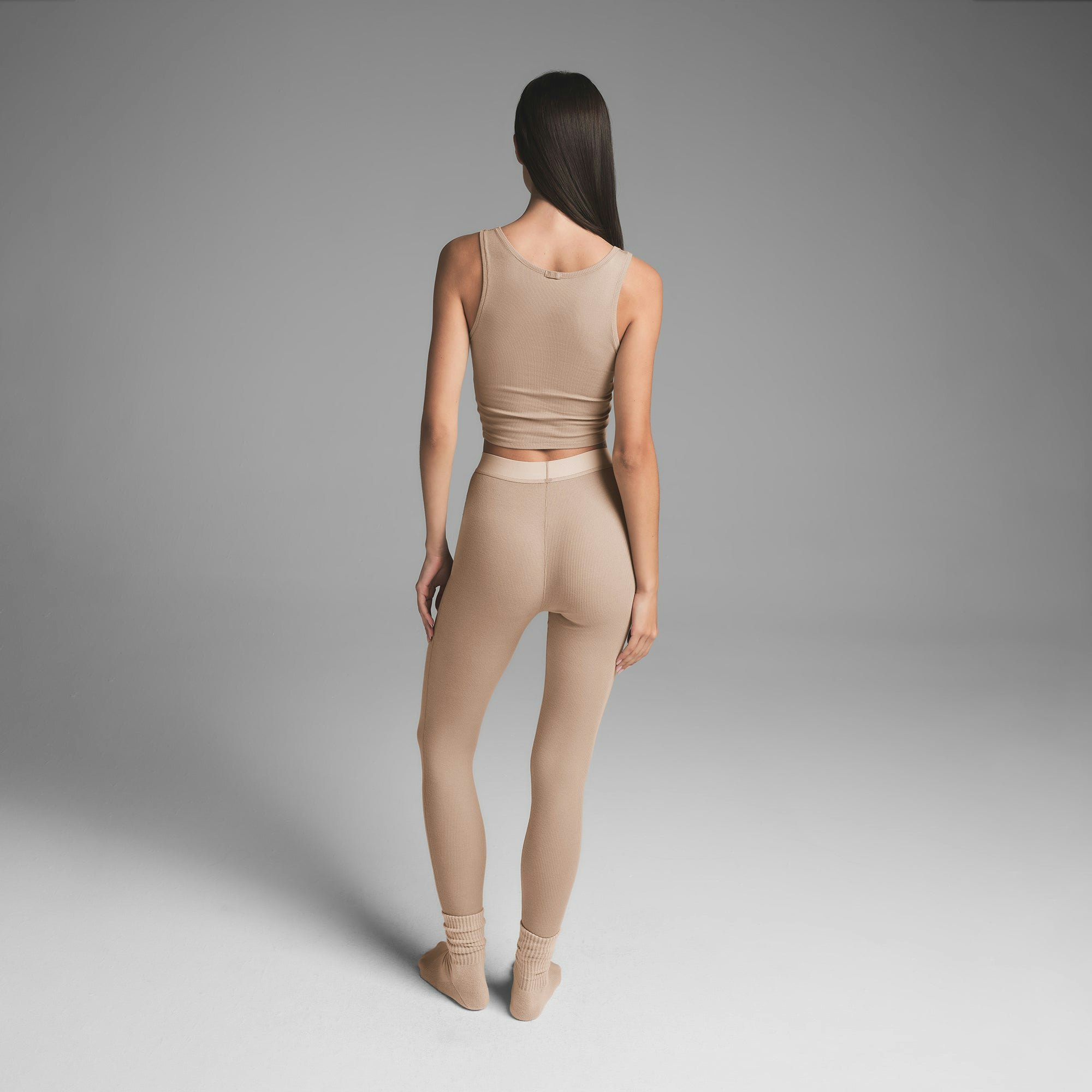COTTON RIB LEGGING | LATTE ON A MODEL BACK VIEW | FOCUS: 0.0, 1.0, 0.9