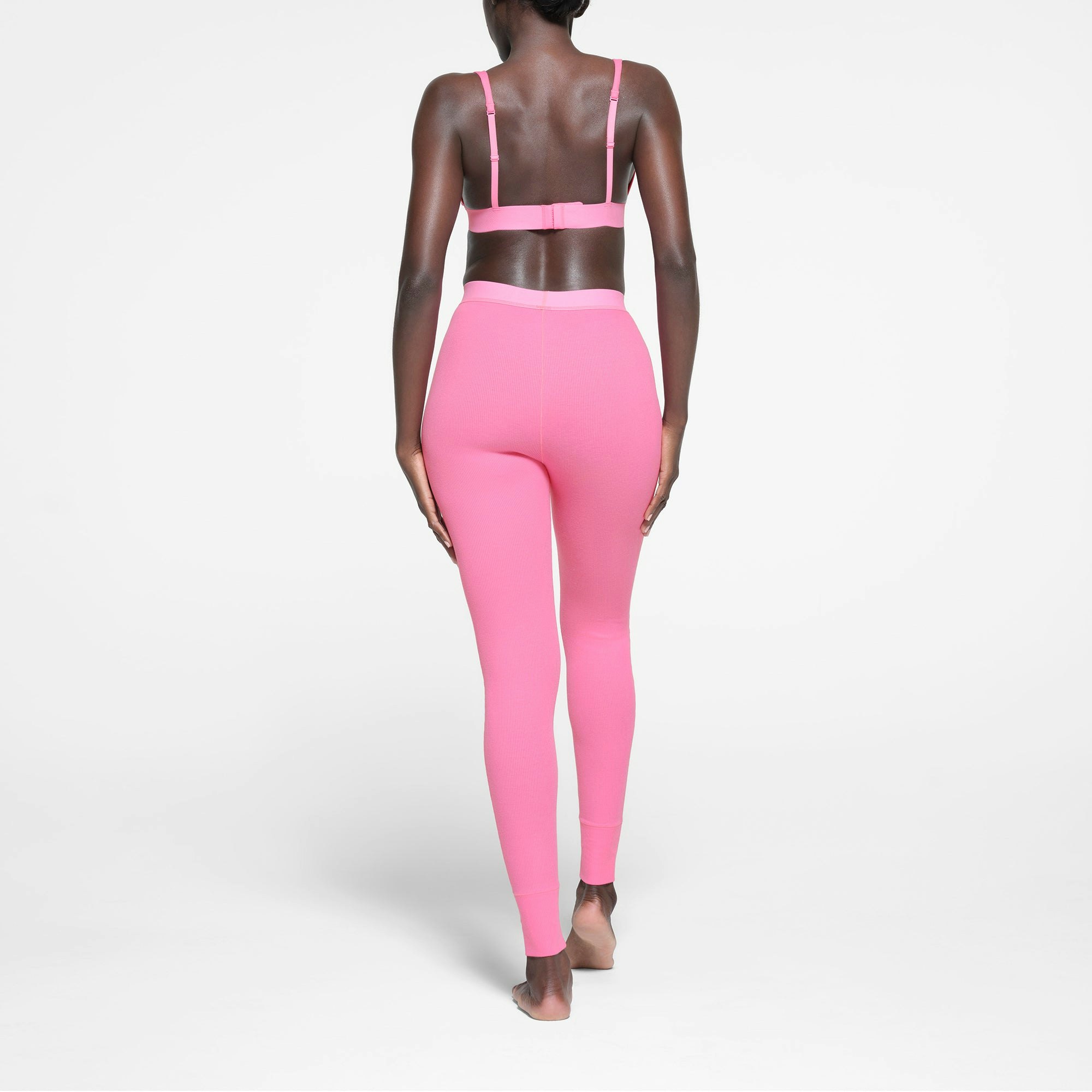 COTTON RIB LEGGING | SUGAR PINK ON A MODEL BACK VIEW