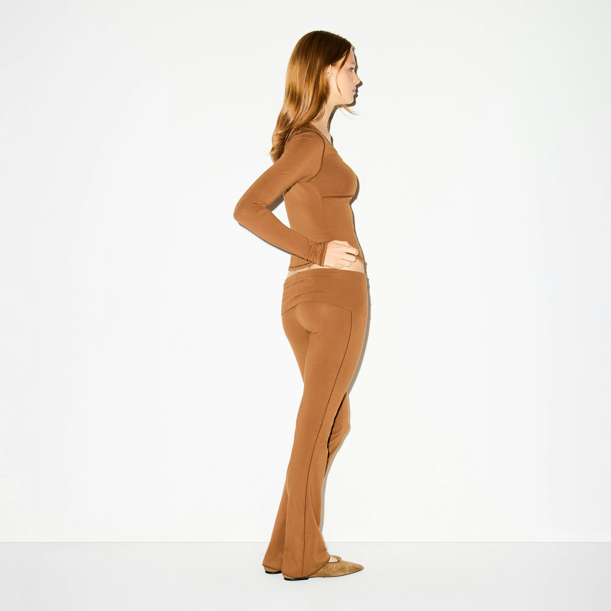 COTTON JERSEY FOLDOVER PANT | CHAI ON A MODEL SIDE VIEW @ | FOCUS: 0.0, 1.0, 0.9