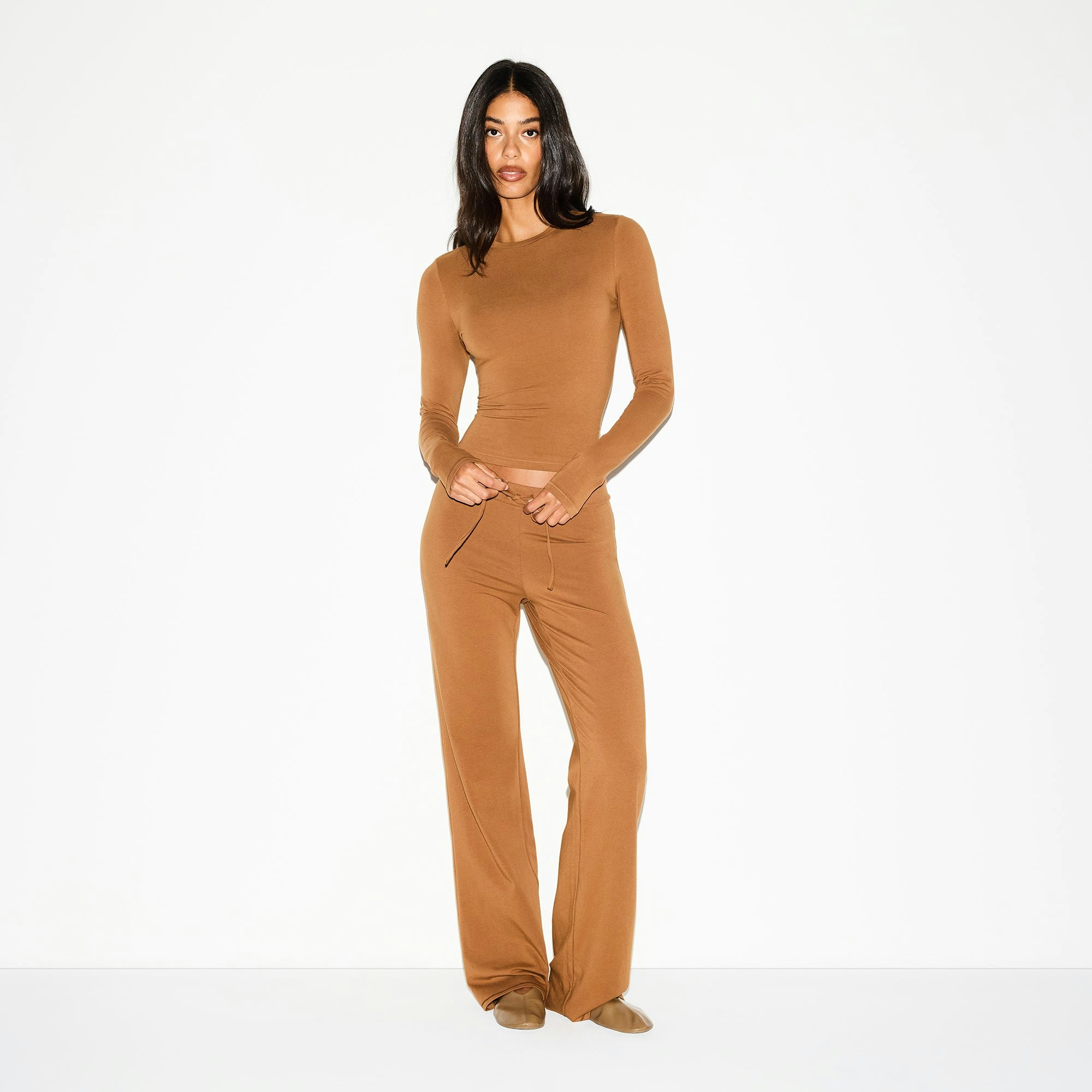 COTTON JERSEY STRAIGHT LEG PANT | CHAI ON A MODEL FRONT VIEW @ | FOCUS: 0.0, 1.0, 0.9