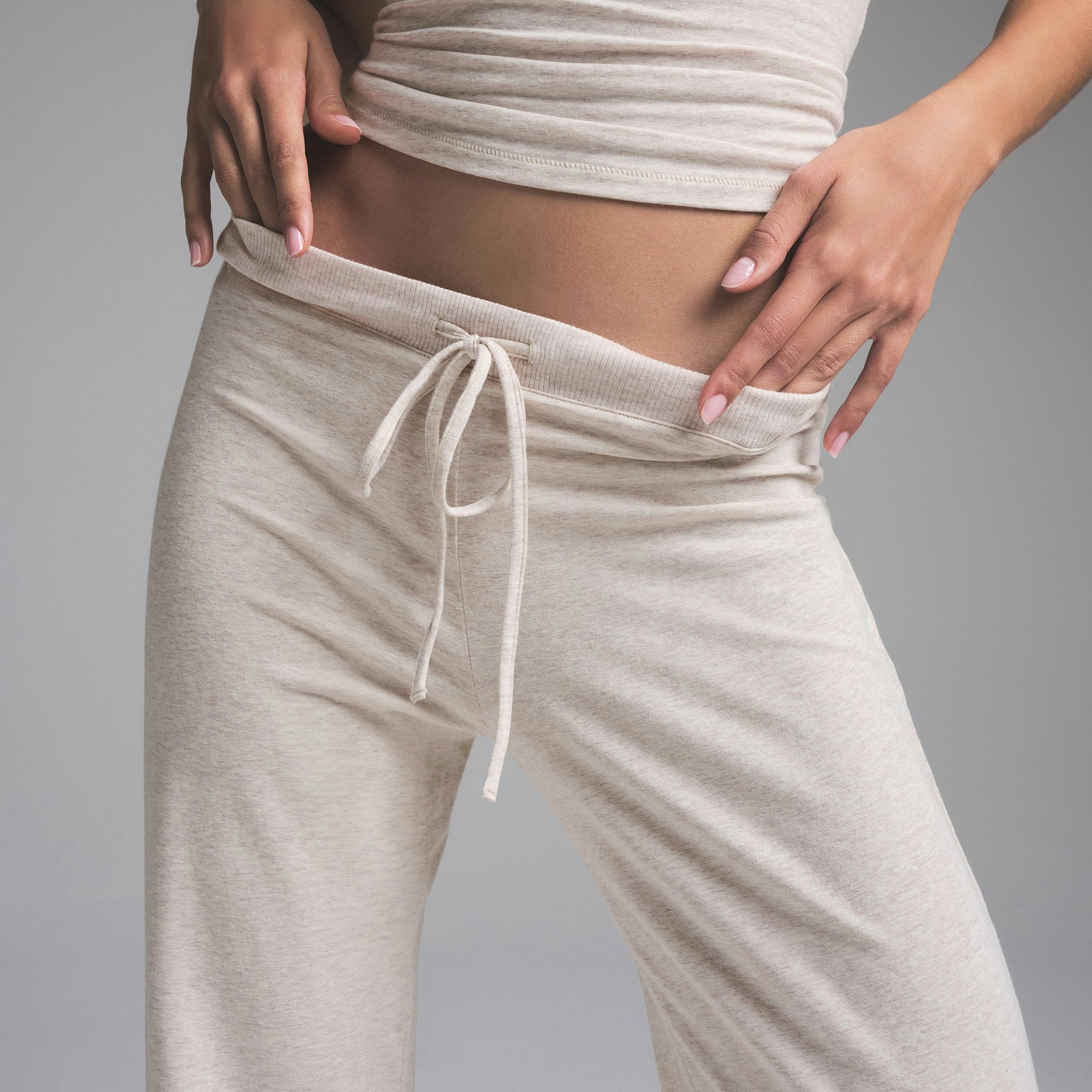 COTTON JERSEY STRAIGHT LEG PANT | HEATHER OATMEAL ON A MODEL FRONT VIEW