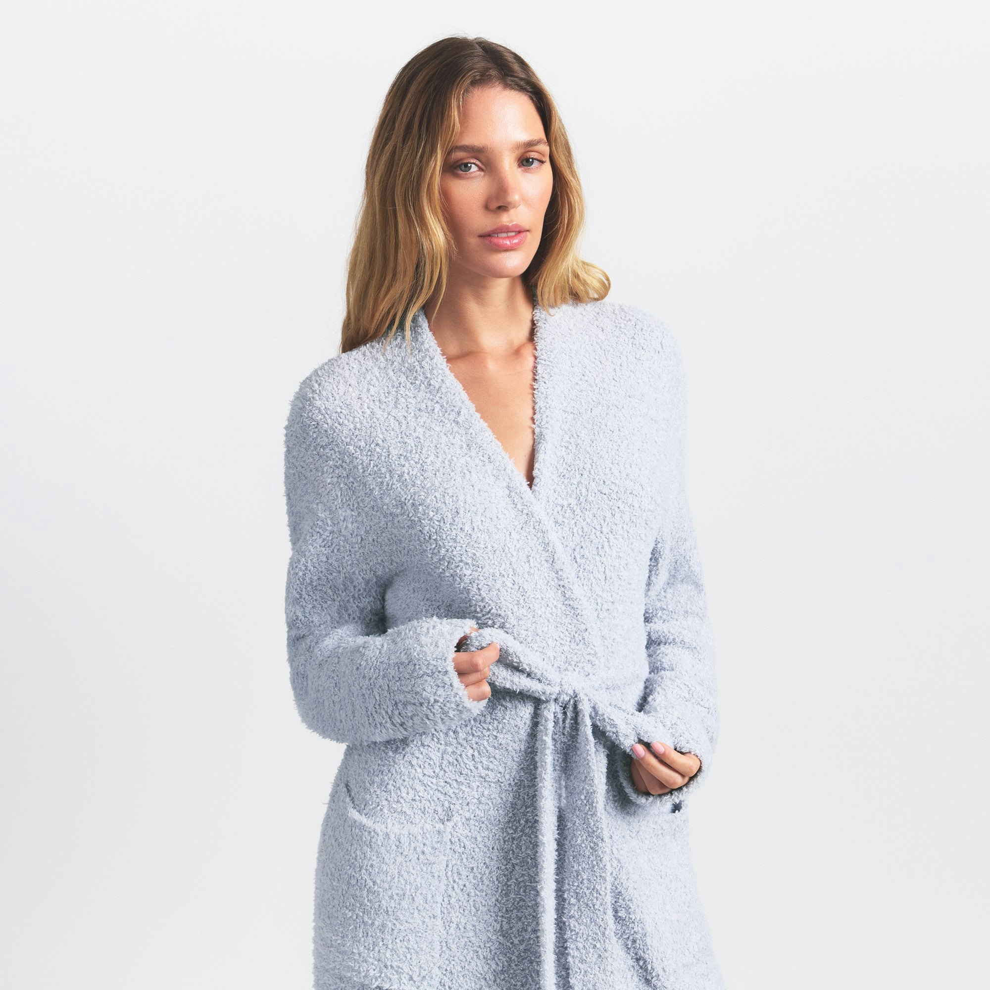 COZY KNIT UNISEX ROBE | ZEN BLUE ON A MODEL SIDE VIEW @ | FOCUS: 0.0, 1.0, 0.9