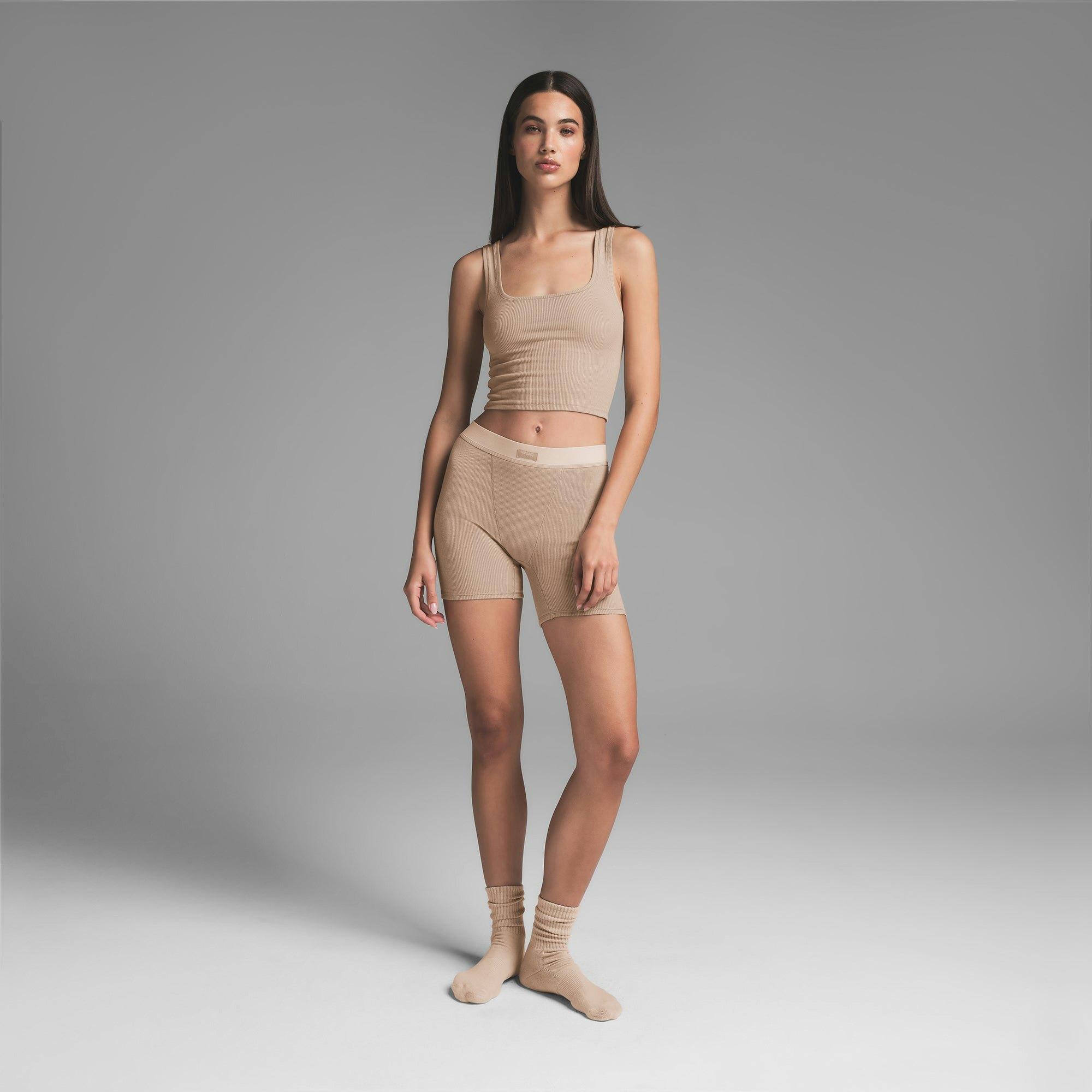 COTTON RIB TANK | LATTE ON A MODEL FRONT VIEW | FOCUS: 0.0, 1.0, 0.9