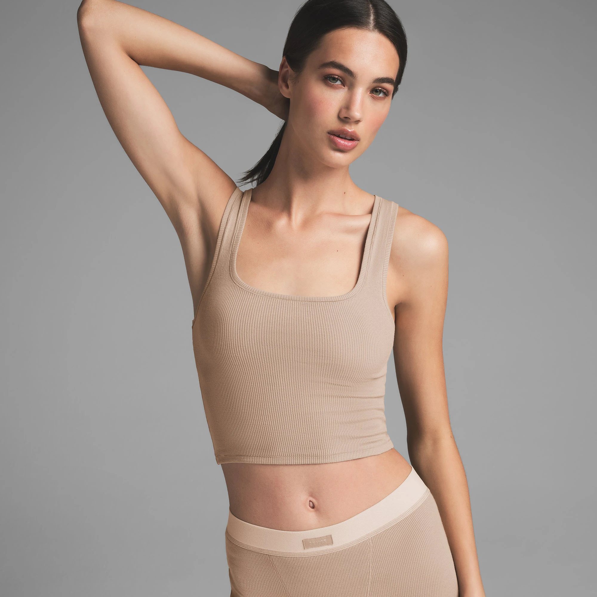 COTTON RIB TANK | LATTE ON A MODEL FRONT VIEW | FOCUS: 0.0, 1.0, 0.9