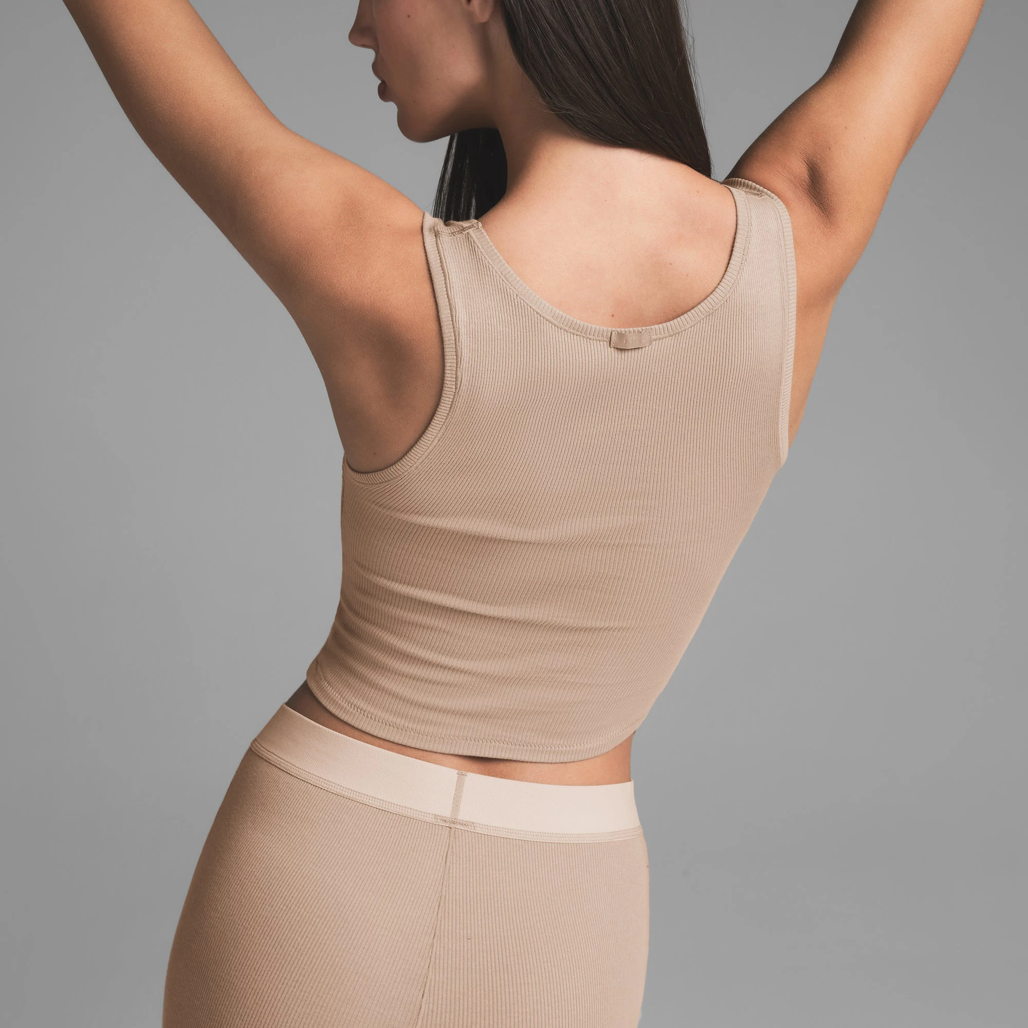 COTTON RIB TANK | LATTE ON A MODEL BACK VIEW | FOCUS: 0.0, 1.0, 0.9