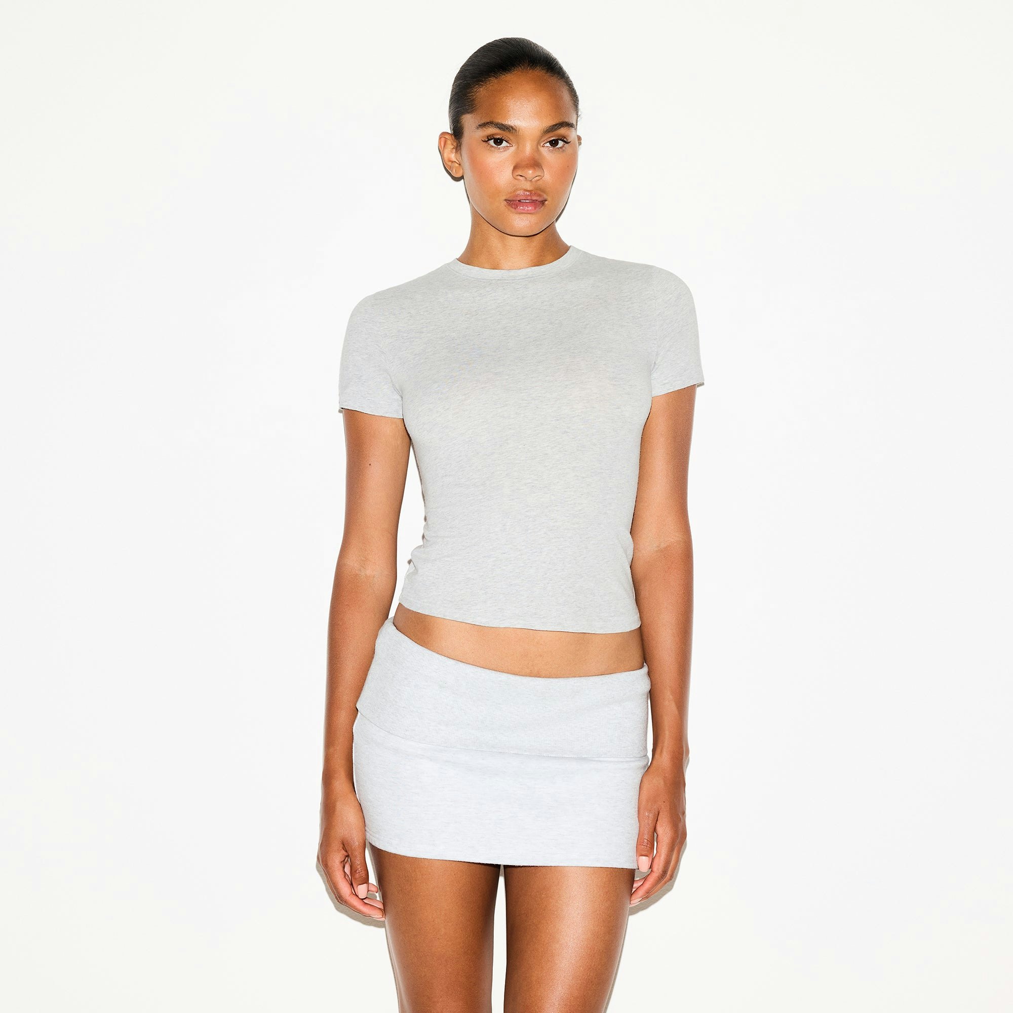 COTTON JERSEY T-SHIRT | LIGHT HEATHER GREY ON A MODEL SIDE VIEW