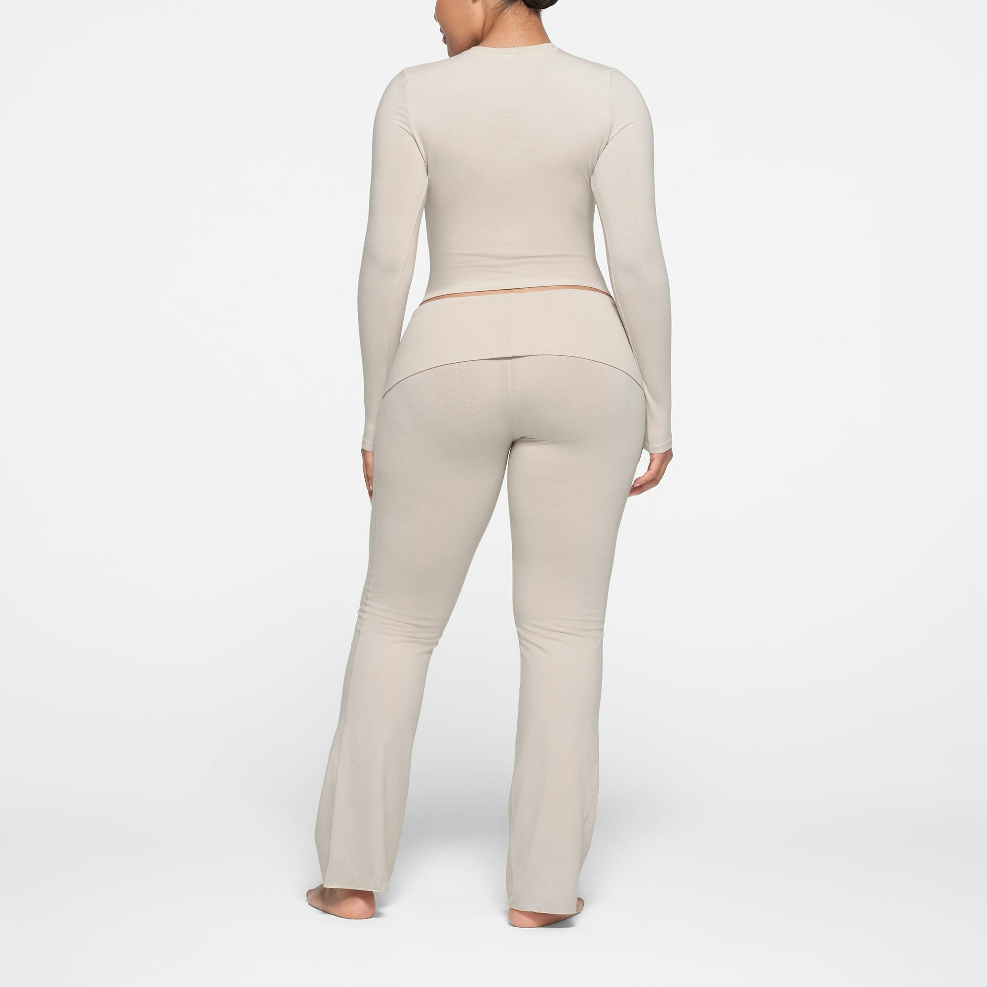 COTTON JERSEY LONG SLEEVE T-SHIRT | STONE ON A MODEL BACK VIEW