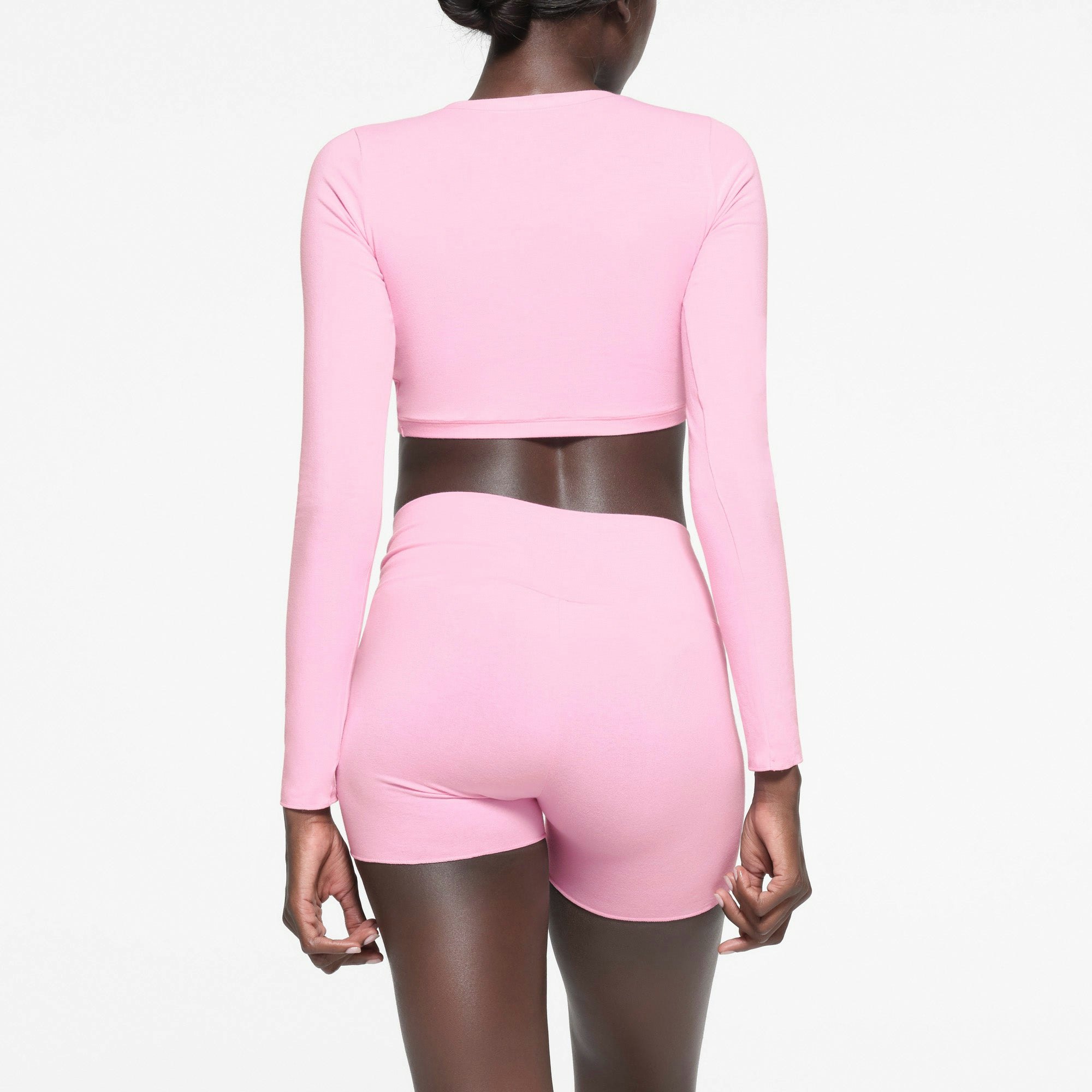 COTTON TWIST LONG SLEEVE TOP | COTTON CANDY ON A MODEL BACK VIEW