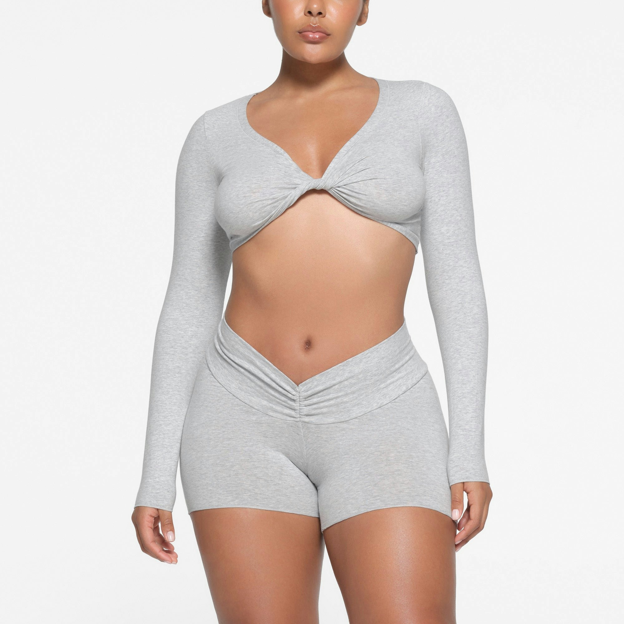 COTTON TWIST LONG SLEEVE TOP | LIGHT HEATHER GREY ON A MODEL FRONT VIEW