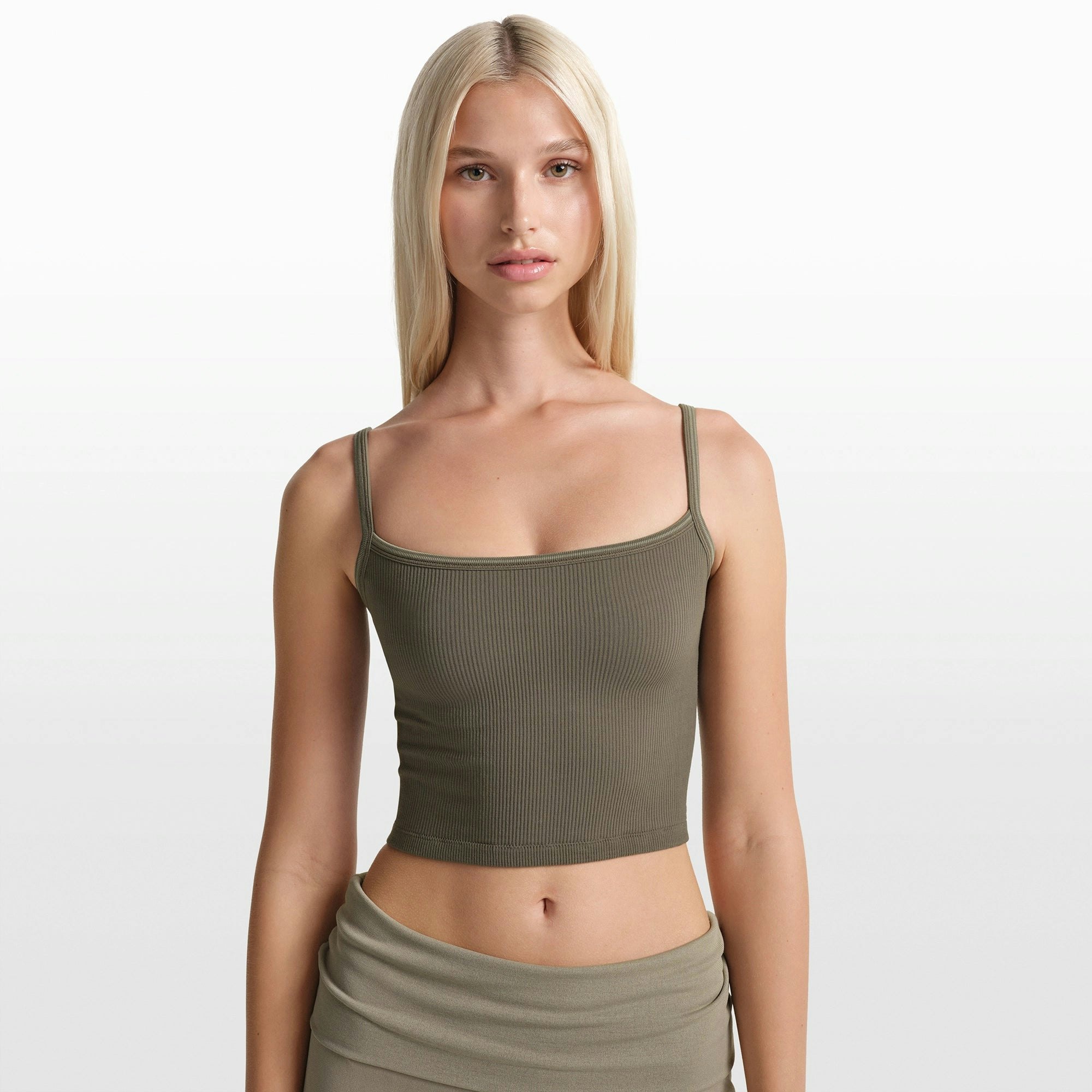 NikeSKIMS RIBBED SEAMLESS CAMI | DUSTY OAKMOSS ON A MODEL FRONT VIEW @ | FOCUS: 0.0, 1.0, 0.9