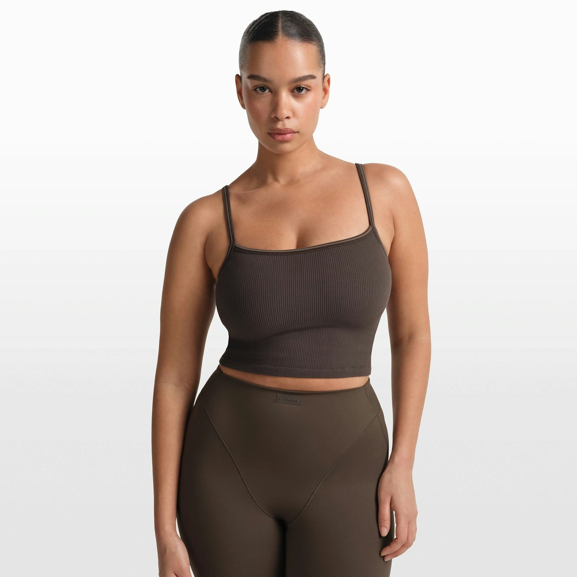 NikeSKIMS RIBBED SEAMLESS CAMI | PHOENIX/TRUFFLE ON A MODEL FRONT VIEW @ | FOCUS: 0.0, 1.0, 0.9