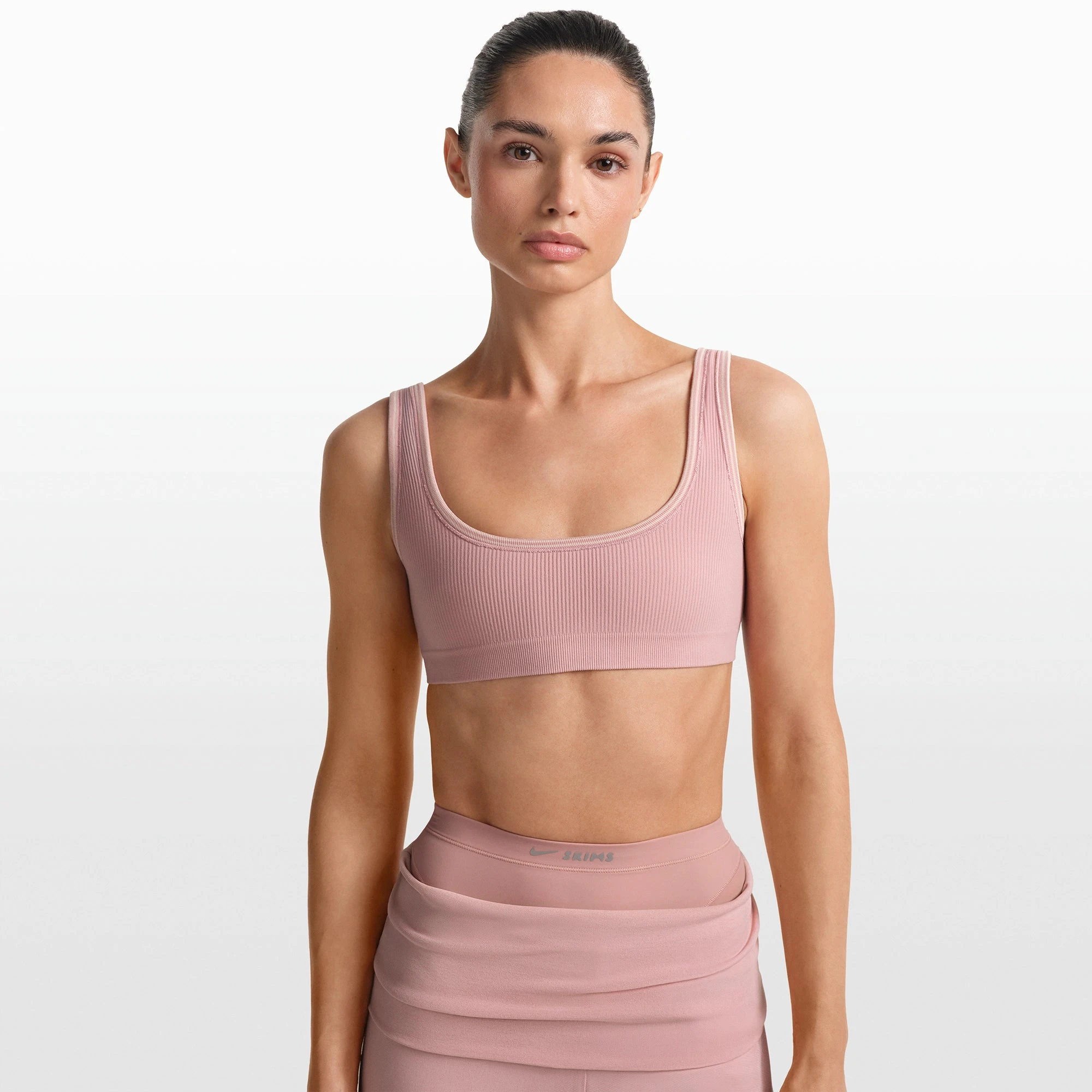 NikeSKIMS RIBBED SEAMLESS MICRO SCOOP BRA | HIMALAYAN ON A MODEL FRONT VIEW @ | FOCUS: 0.0, 1.0, 0.9