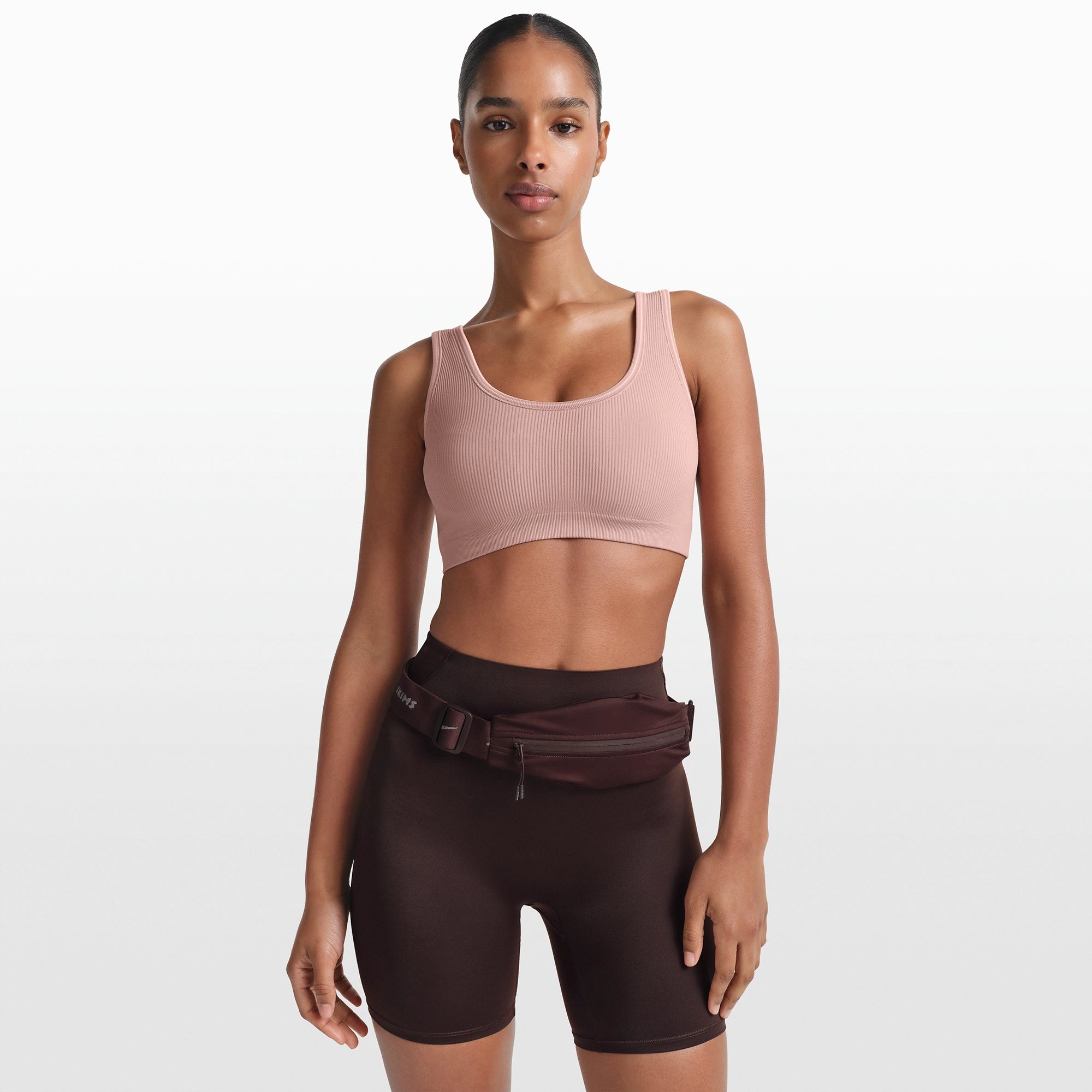 NikeSKIMS RIBBED SEAMLESS SCOOP BRA | HIMALAYAN/ECRU ON A MODEL FRONT VIEW @ | FOCUS: 0.0, 1.0, 0.9