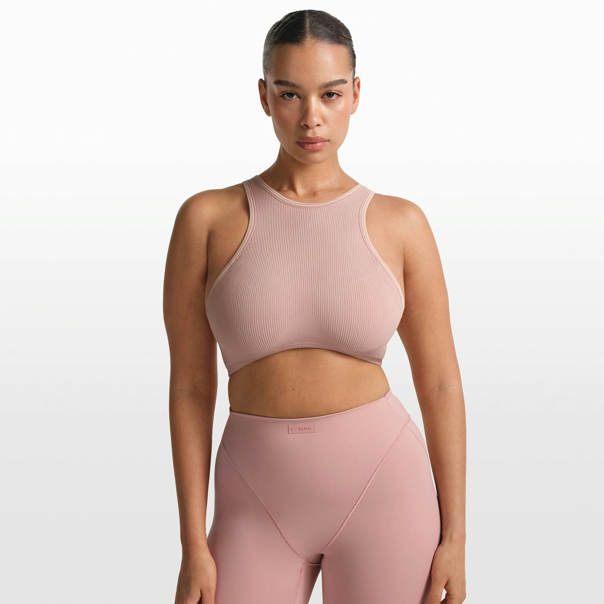 NikeSKIMS RIBBED SEAMLESS RACER FRONT BRA | HIMALAYAN ON A MODEL FRONT VIEW @ | FOCUS: 0.0, 1.0, 0.9