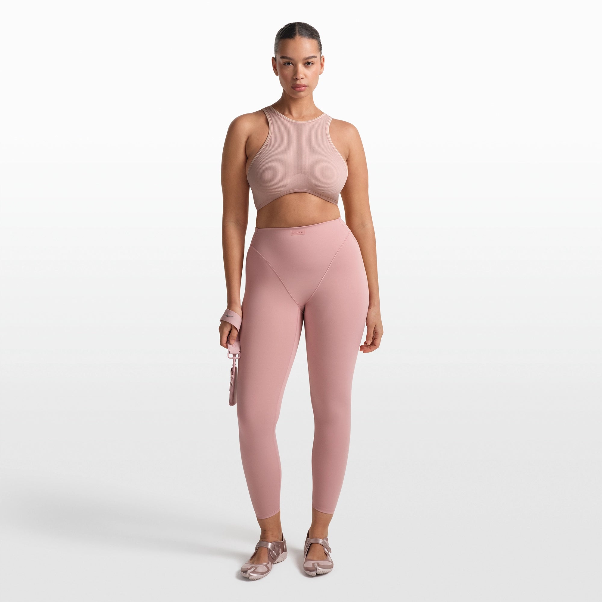 NikeSKIMS RIBBED SEAMLESS RACER FRONT BRA | HIMALAYAN ON A MODEL FRONT VIEW @ | FOCUS: 0.0, 1.0, 0.9