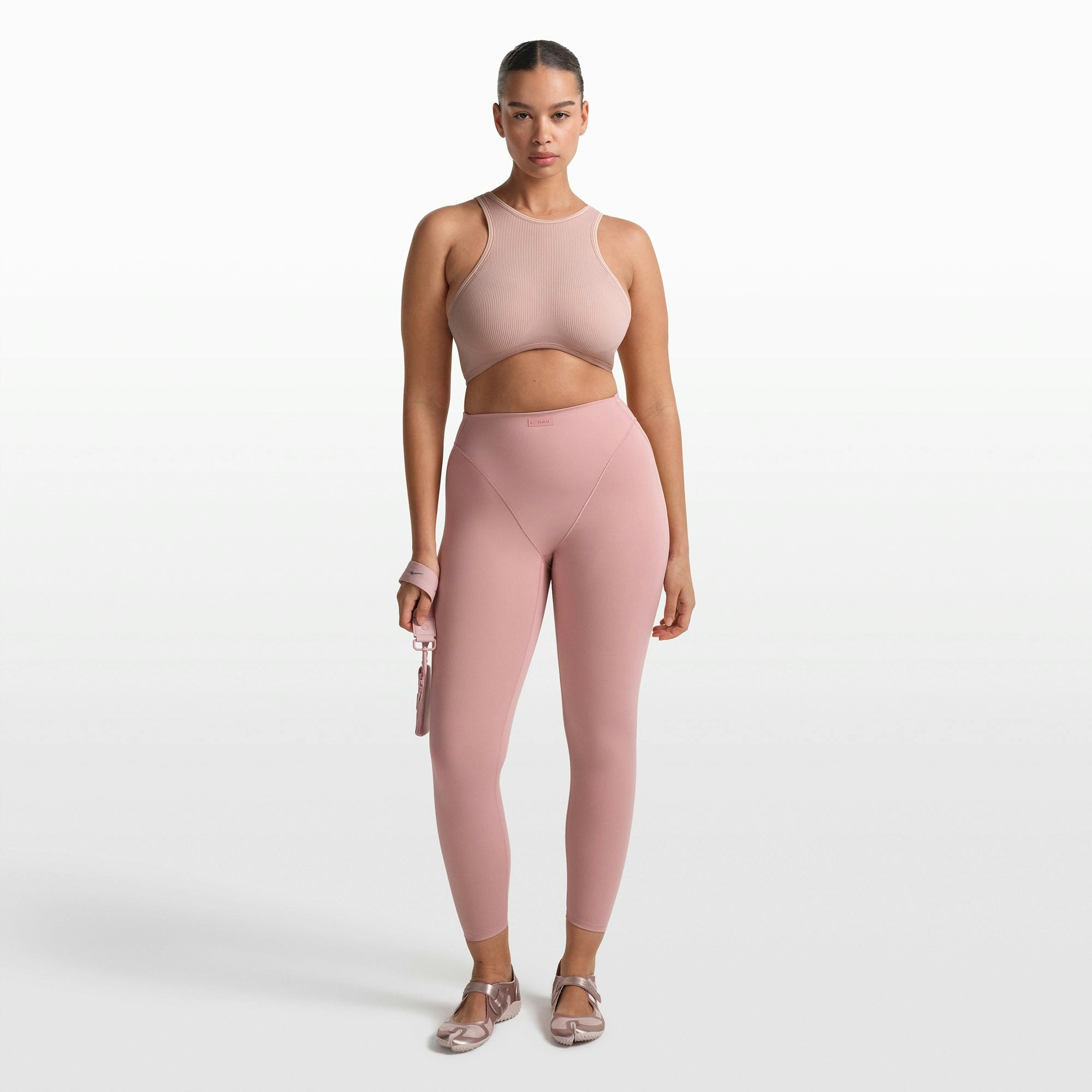 NikeSKIMS RIBBED SEAMLESS RACER FRONT BRA | HIMALAYAN ON A MODEL FRONT VIEW @ | FOCUS: 0.0, 1.0, 0.9