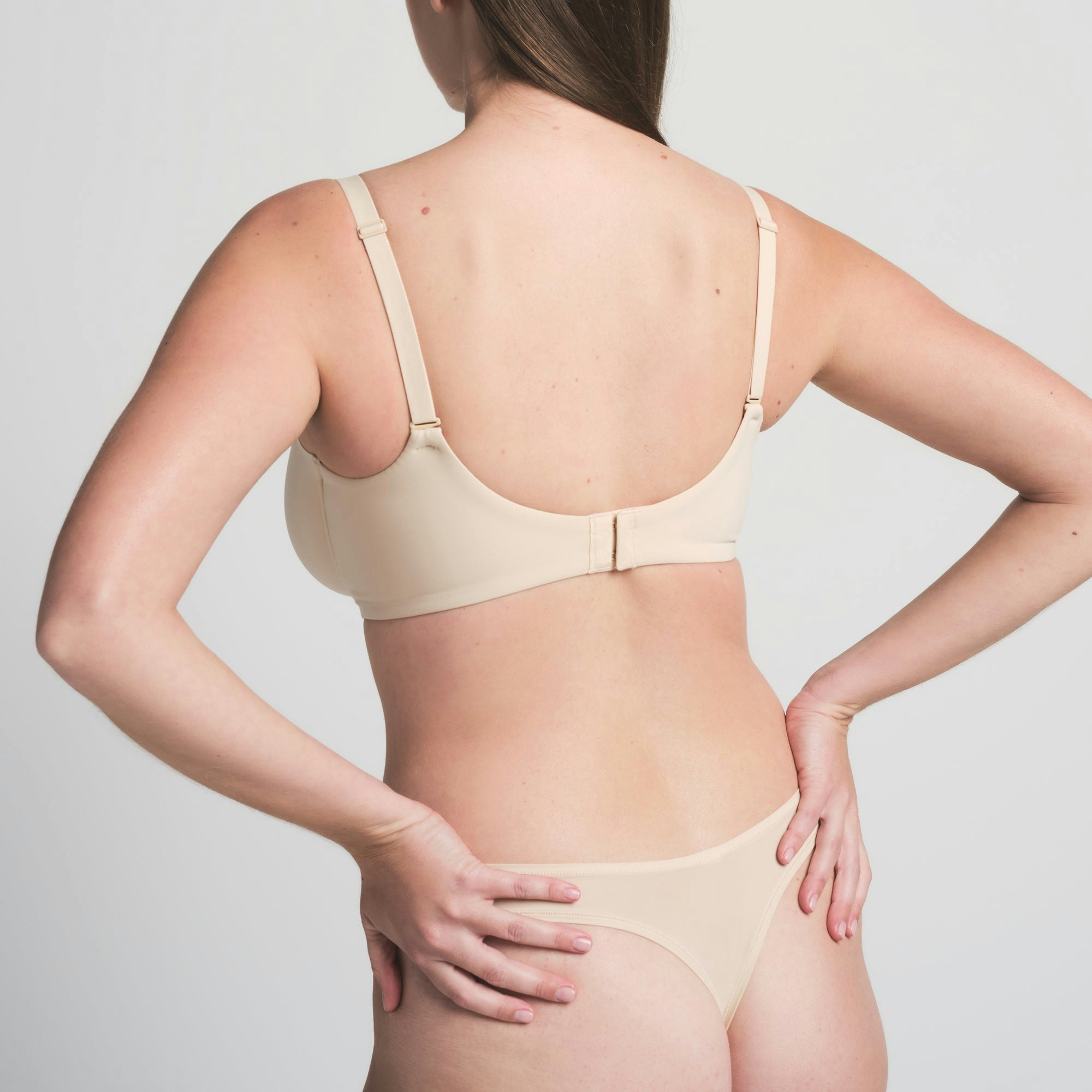 FITS EVERYBODY UNLINED DEMI BRA | SAND ON A MODEL BACK VIEW | FOCUS: 0.0, 1.0, 0.9