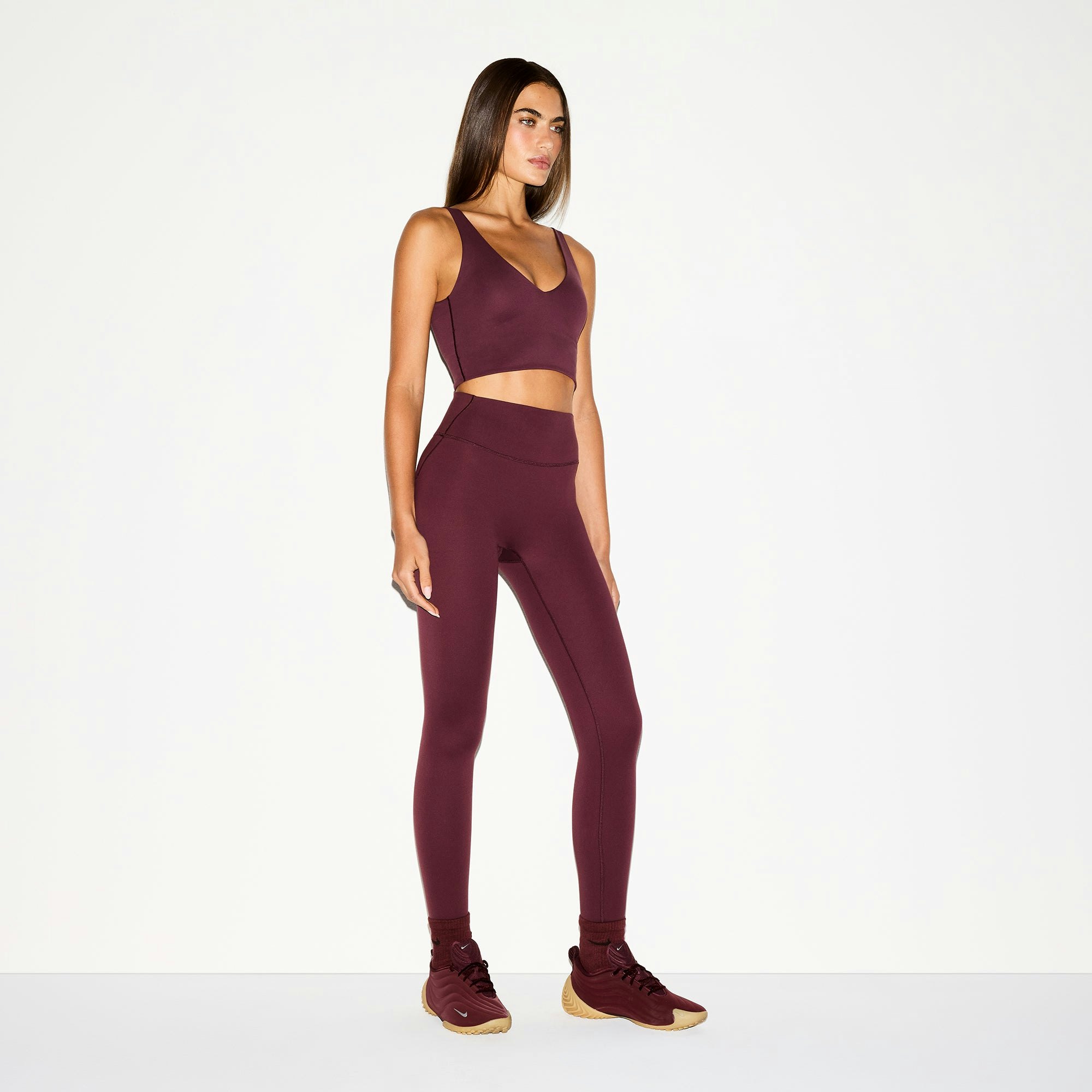 NikeSKIMS MATTE V-NECK BRA TOP | CURRANT ON A MODEL SIDE VIEW @ | FOCUS: 0.0, 1.0, 0.9