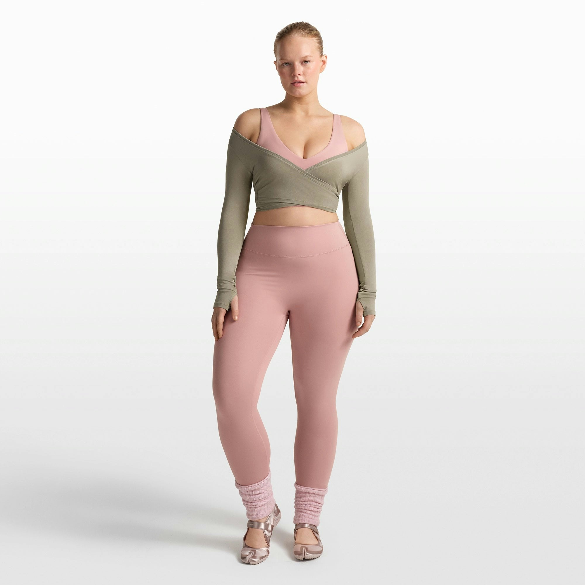 NikeSKIMS MATTE V-NECK BRA TOP | HIMALAYAN ON A MODEL FRONT VIEW @ | FOCUS: 0.0, 1.0, 0.9