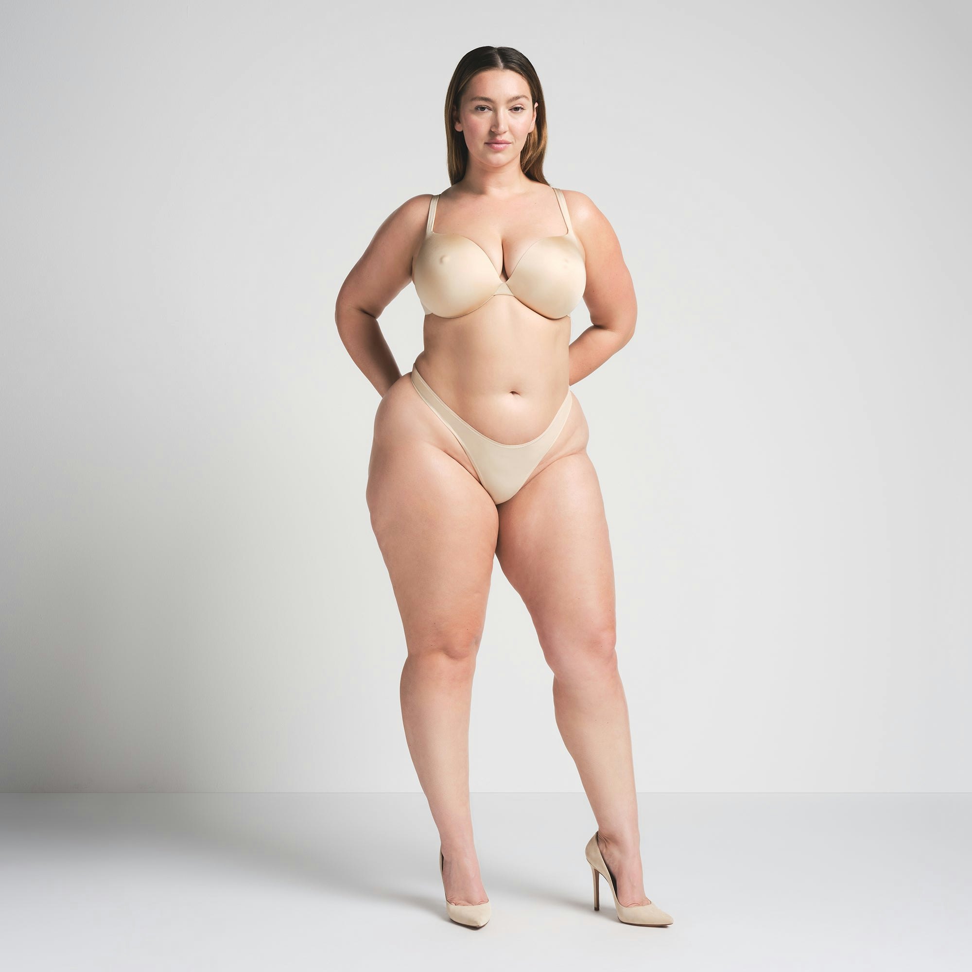 SKIMS ULTIMATE NIPPLE PUSH-UP BRA | SAND ON A MODEL FRONT VIEW @ | FOCUS: 0.0, 1.0, 0.9