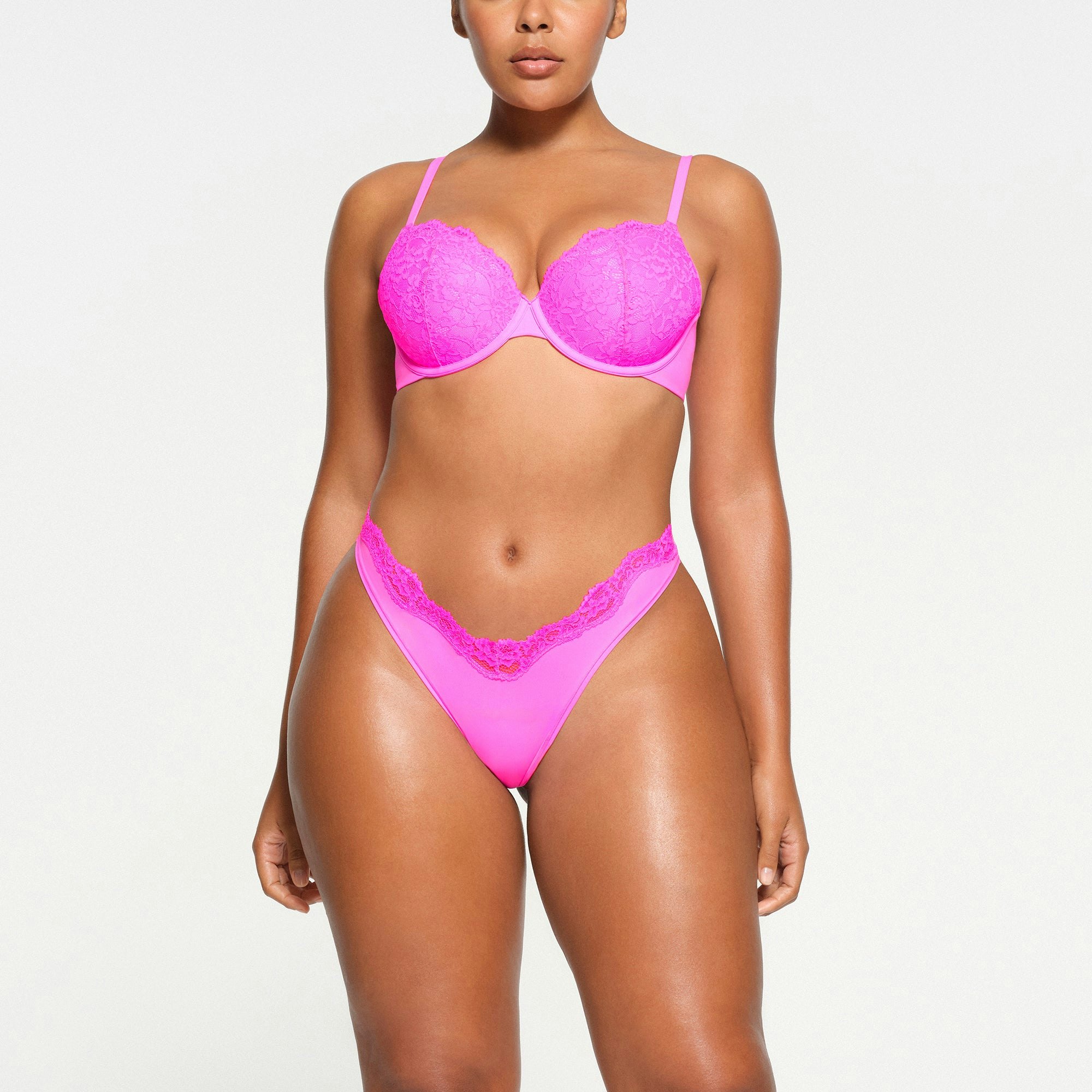 FITS EVERYBODY LACE T-SHIRT BRA | NEON PINK ON A MODEL FRONT VIEW