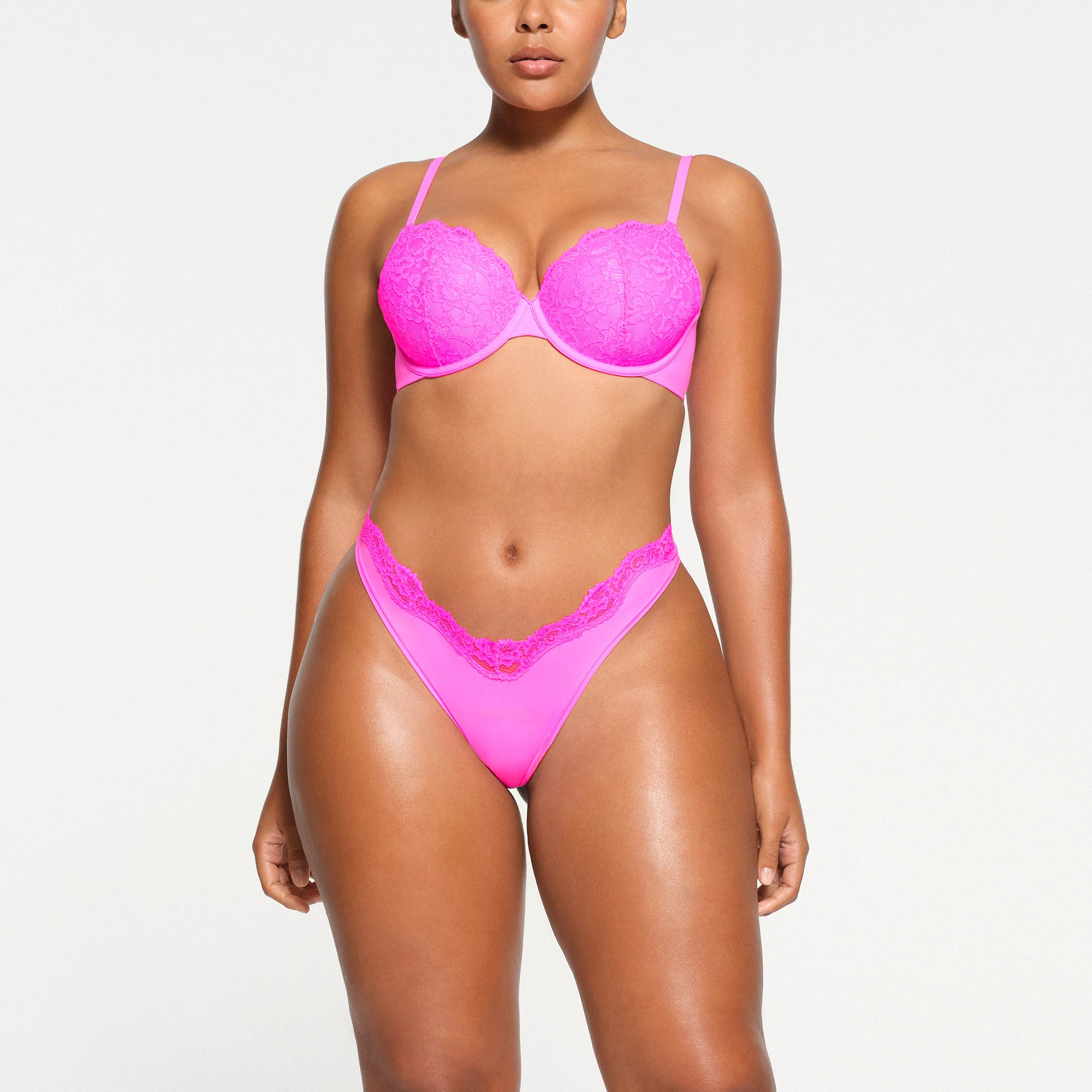 FITS EVERYBODY LACE T-SHIRT BRA | NEON PINK ON A MODEL FRONT VIEW