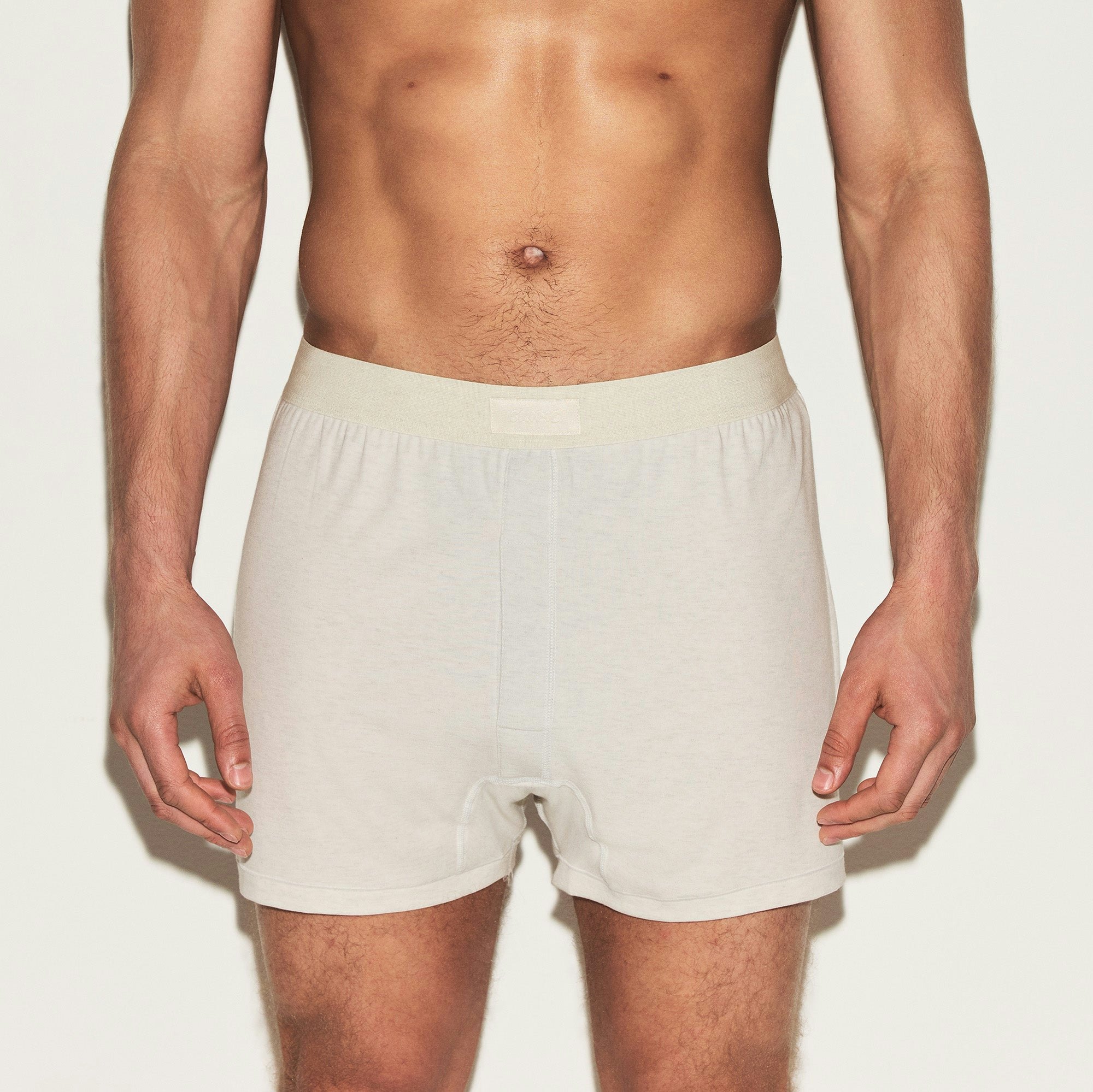 SKIMS COTTON MENS KNIT BOXER 3-PACK | ARMY MULTI ON A MODEL FRONT VIEW | FOCUS: 0.0, 1.0, 0.9