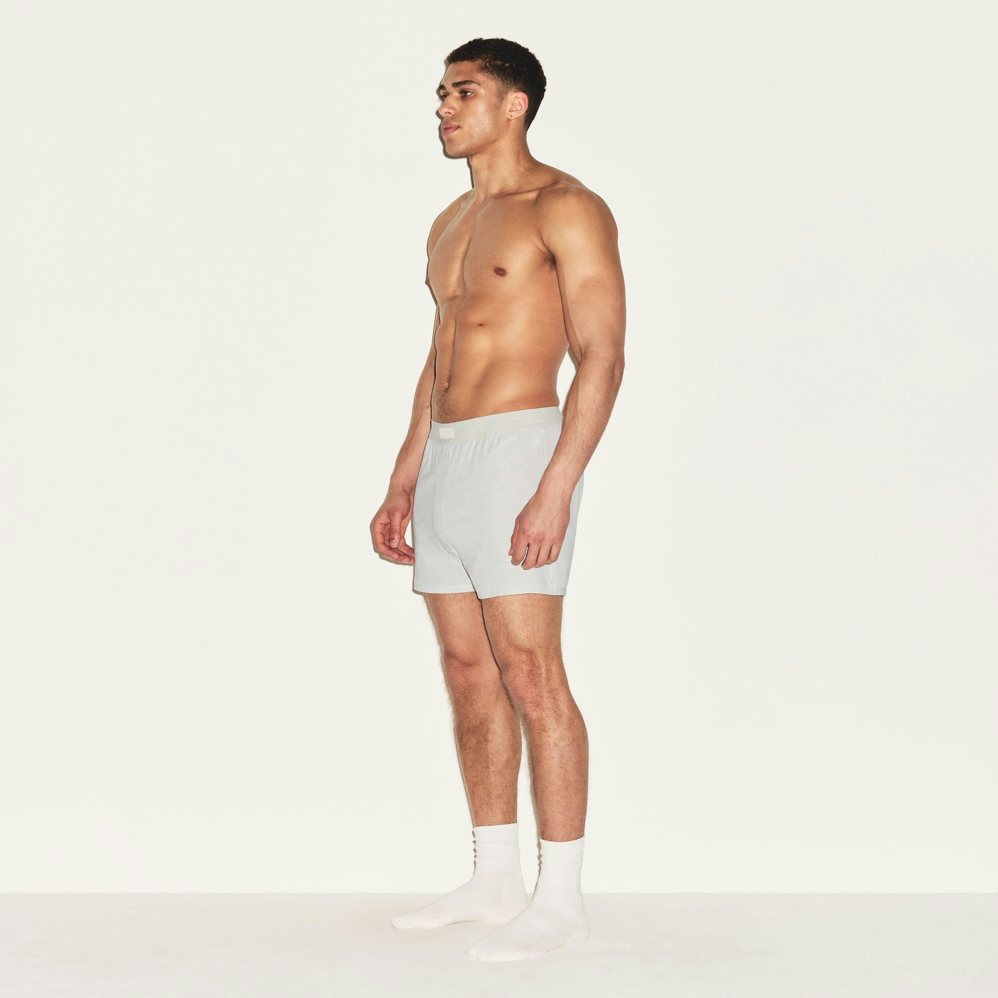 SKIMS COTTON MENS KNIT BOXER 3-PACK | HEATHER MULTI ON A MODEL FRONT VIEW | FOCUS: 0.0, 1.0, 0.9