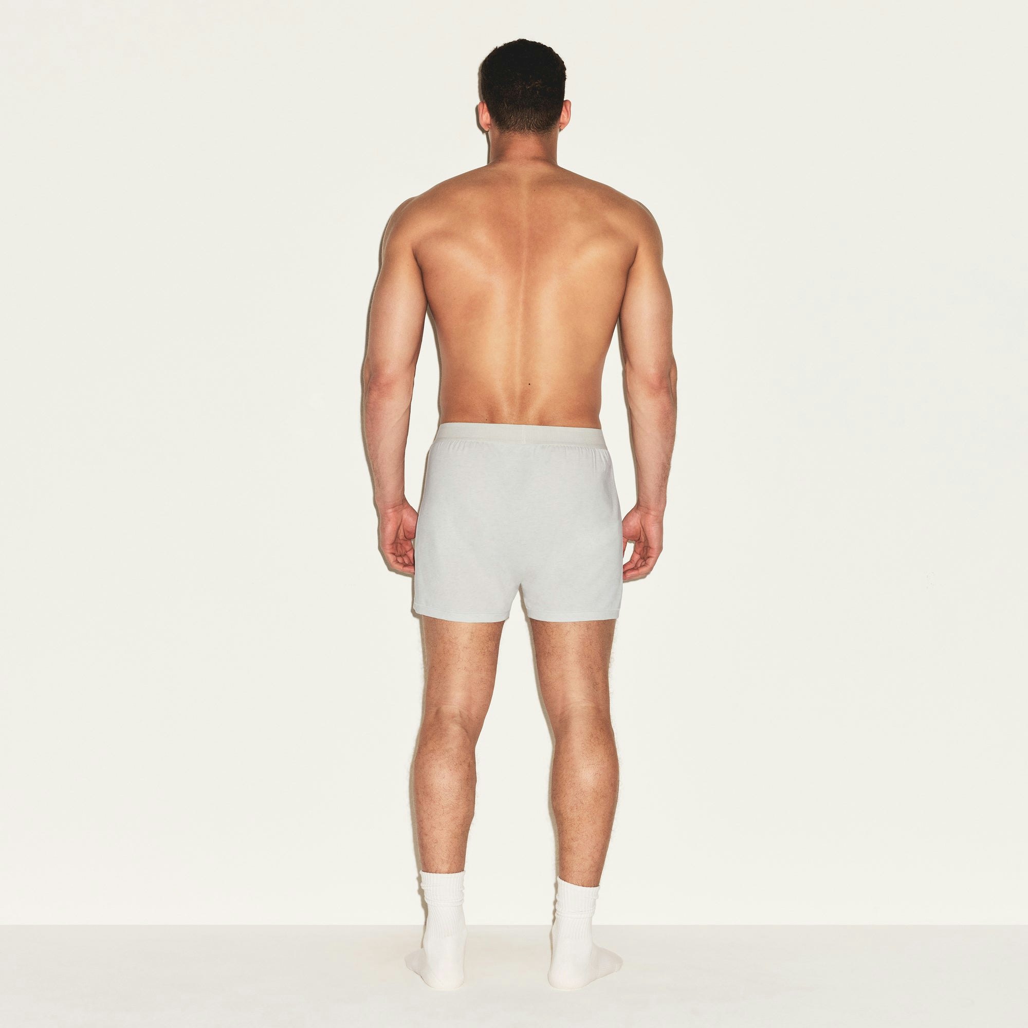 SKIMS COTTON MENS KNIT BOXER 3-PACK | HEATHER MULTI ON A MODEL FRONT VIEW | FOCUS: 0.0, 1.0, 0.9