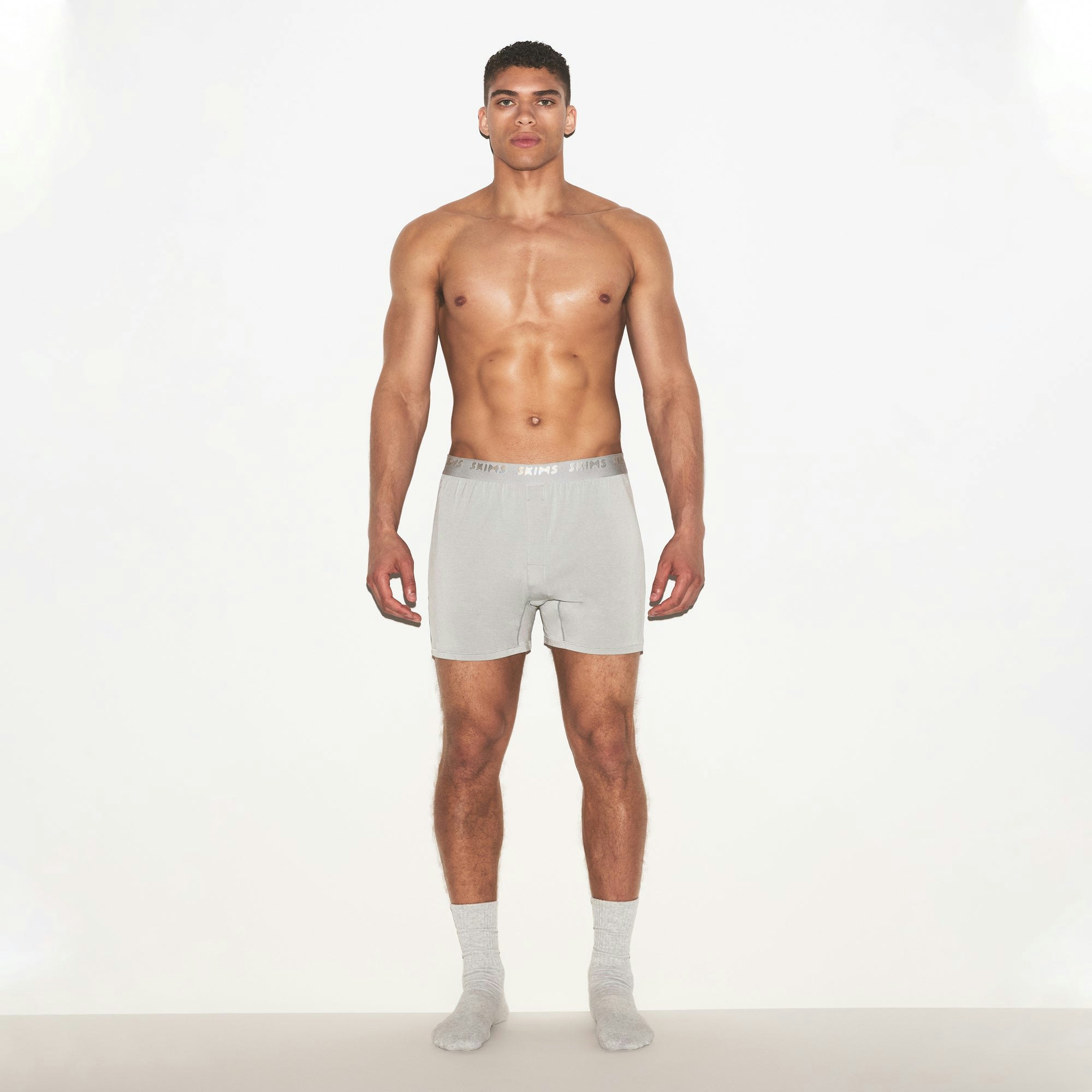 SKIMS STRETCH MENS KNIT BOXER 3-PACK | GUNMETAL MULTI ON A MODEL FRONT VIEW | FOCUS: 0.0, 1.0, 0.9