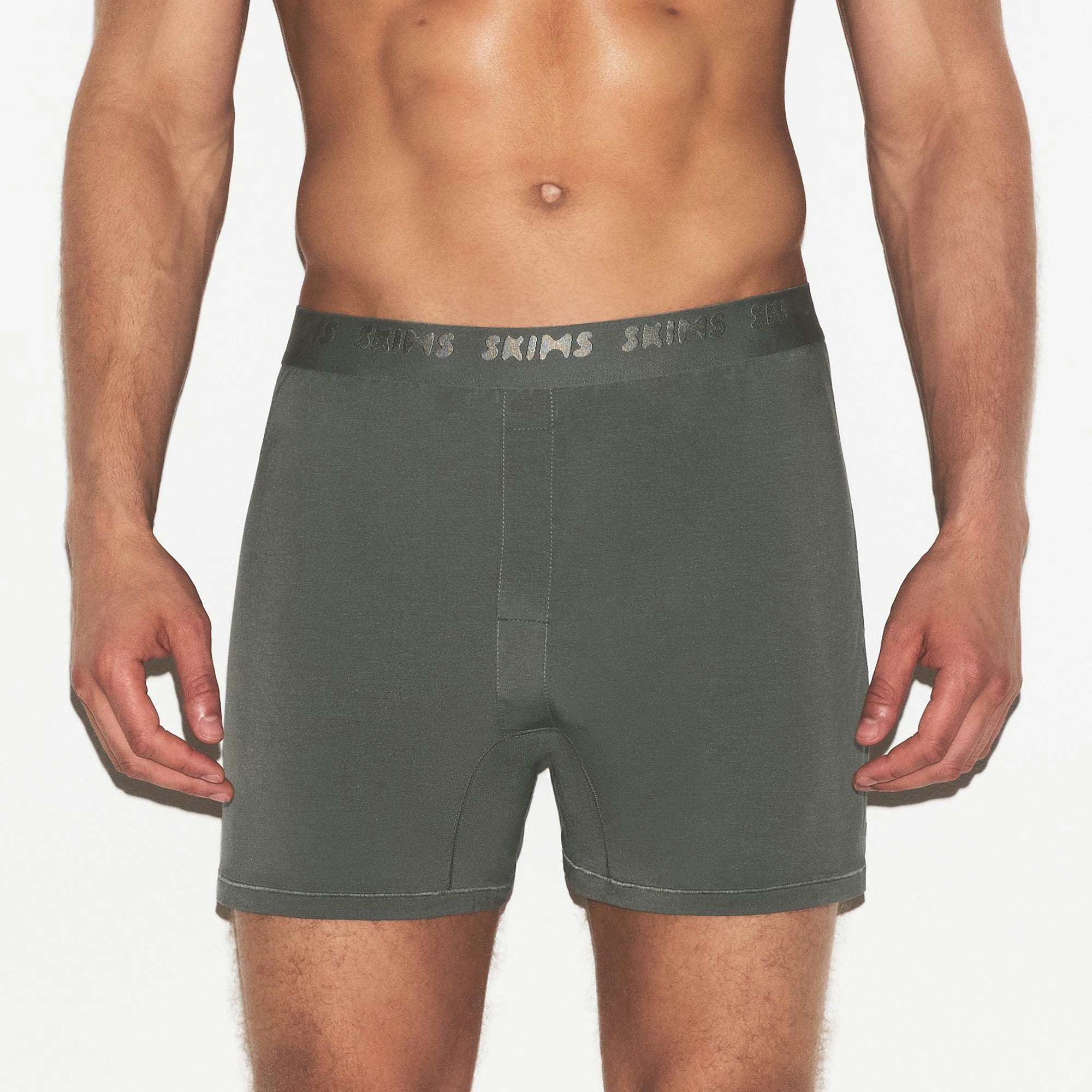 SKIMS STRETCH MENS KNIT BOXER 3-PACK | GUNMETAL MULTI ON A MODEL SIDE VIEW | FOCUS: 0.0, 1.0, 0.9