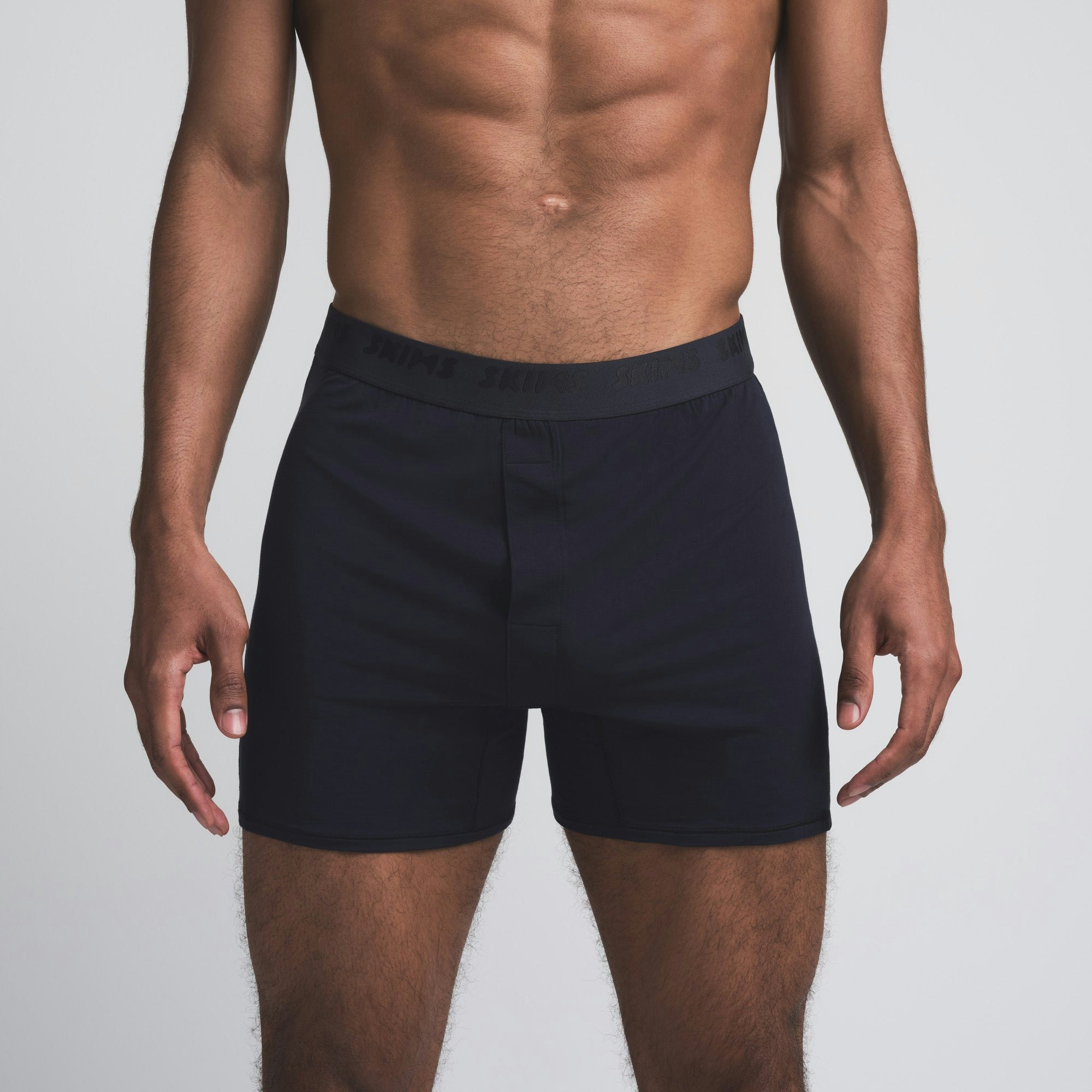 SKIMS STRETCH MENS KNIT BOXER 3-PACK | INDIGO MULTI ON A MODEL FRONT VIEW | FOCUS: 0.0, 1.0, 0.9