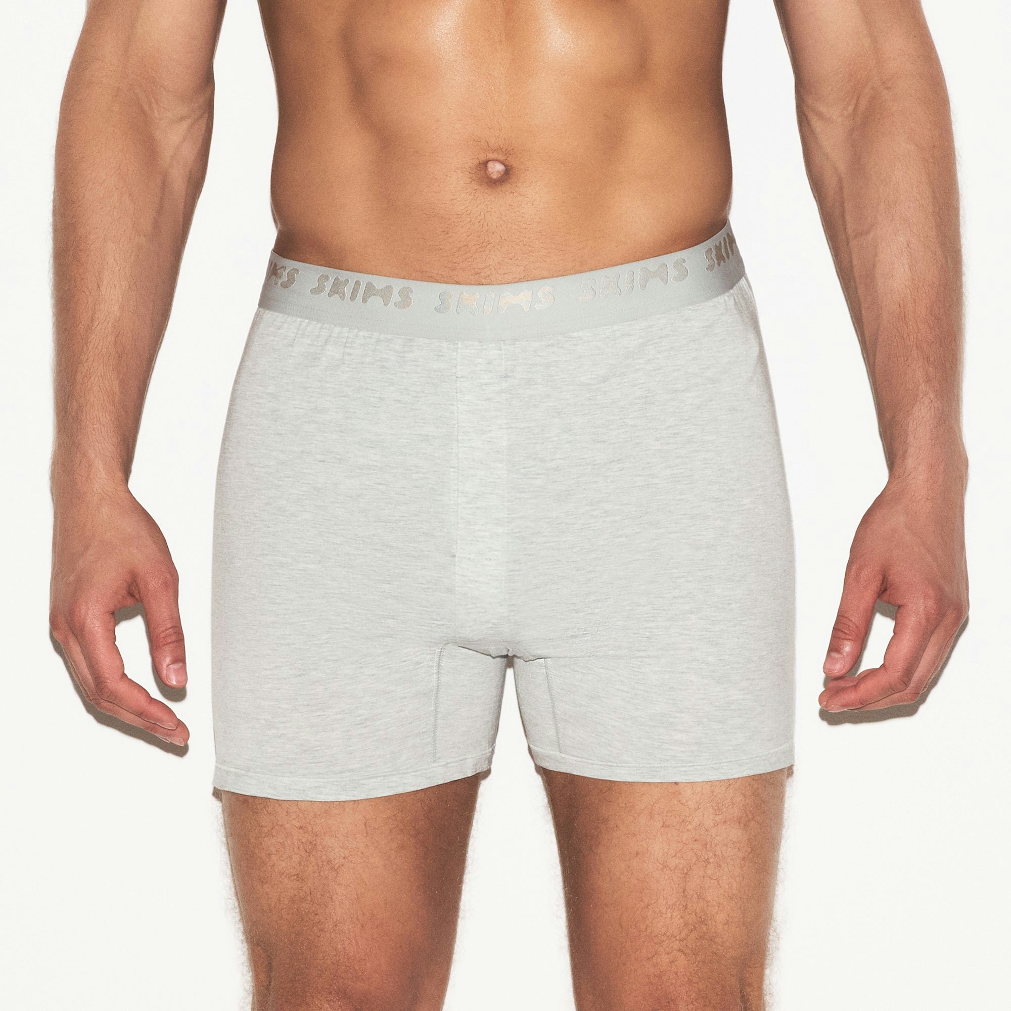 SKIMS STRETCH MENS KNIT BOXER 3-PACK | LAUREL MULTI ON A MODEL SIDE VIEW