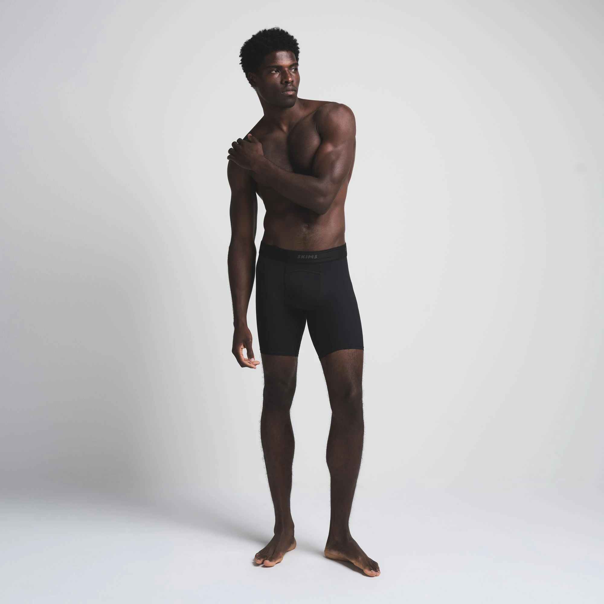 SKIMS SPORT MENS 5" BOXER BRIEF 3-PACK | AMETHYST MULTI (MENS BOXERS) ON A MODEL FRONT VIEW