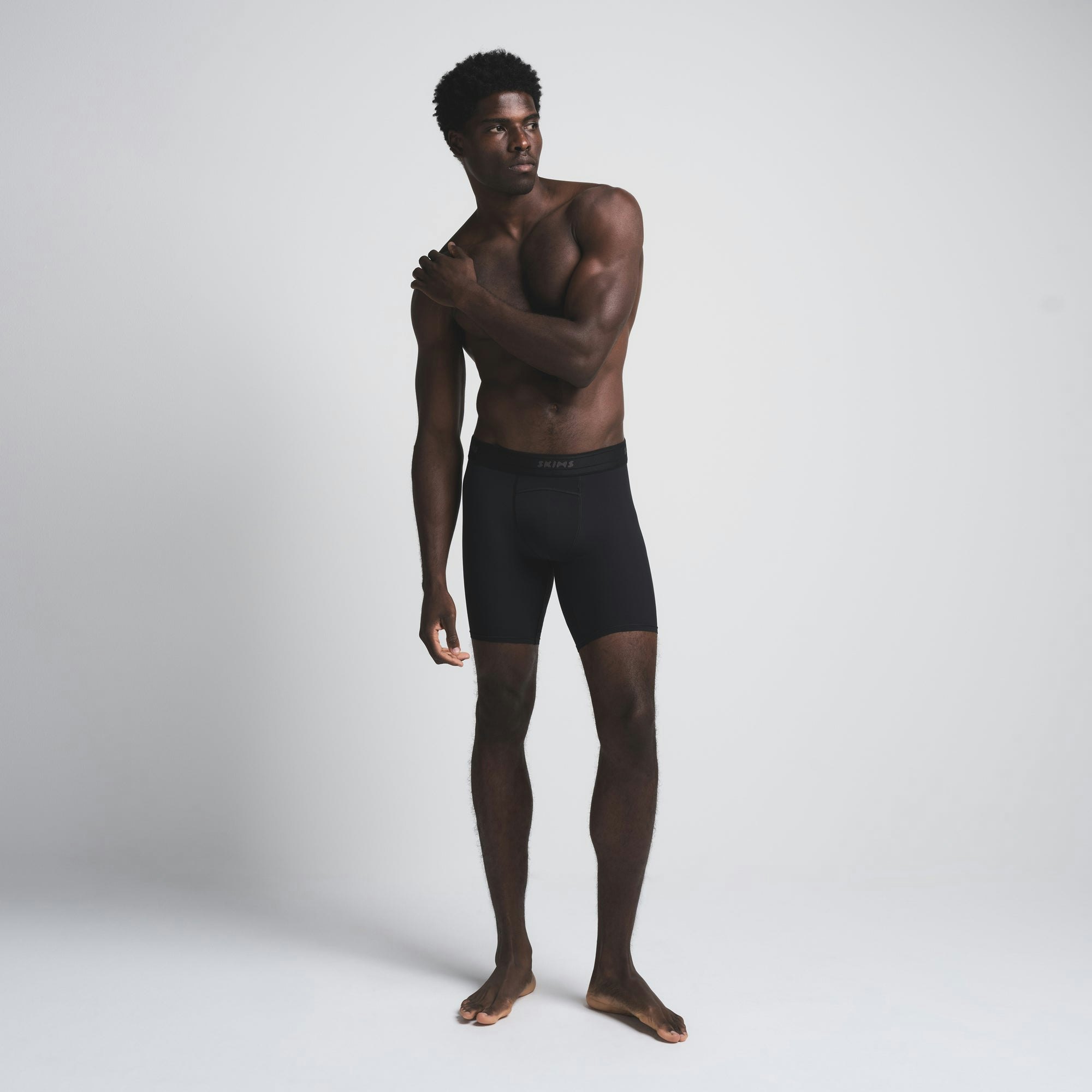 SKIMS SPORT MENS 5" BOXER BRIEF 3-PACK | AMETHYST MULTI (MENS BOXERS) ON A MODEL FRONT VIEW