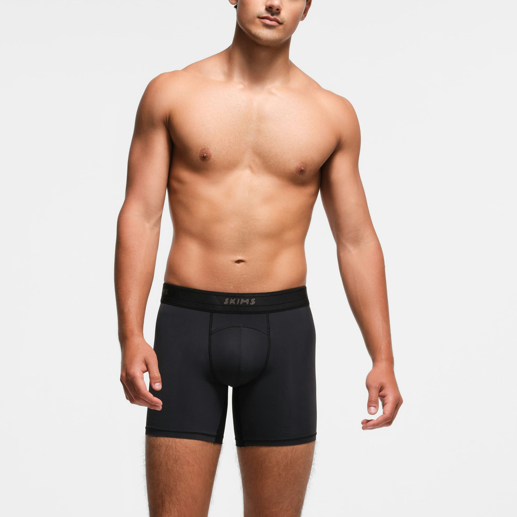 SKIMS SPORT MENS 5" BOXER BRIEF 3-PACK | OBSIDIAN ON A MODEL FRONT VIEW