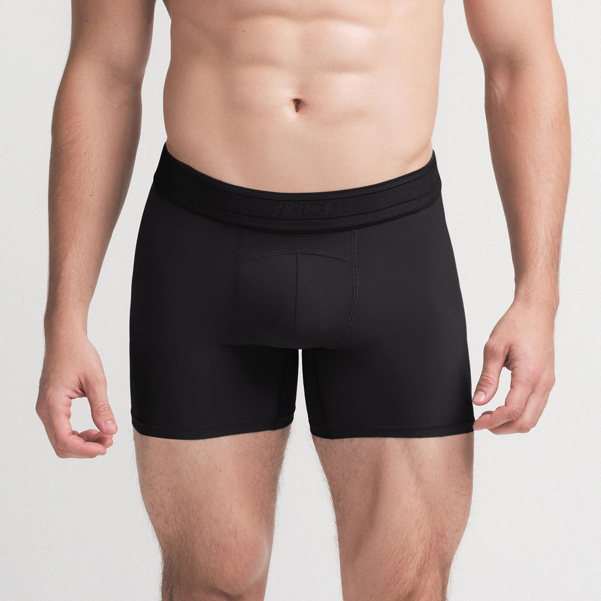 SKIMS SPORT MENS 5" BOXER BRIEF 3-PACK | SANGRIA MULTI ON A MODEL SIDE VIEW | FOCUS: 0.0, 1.0, 0.9