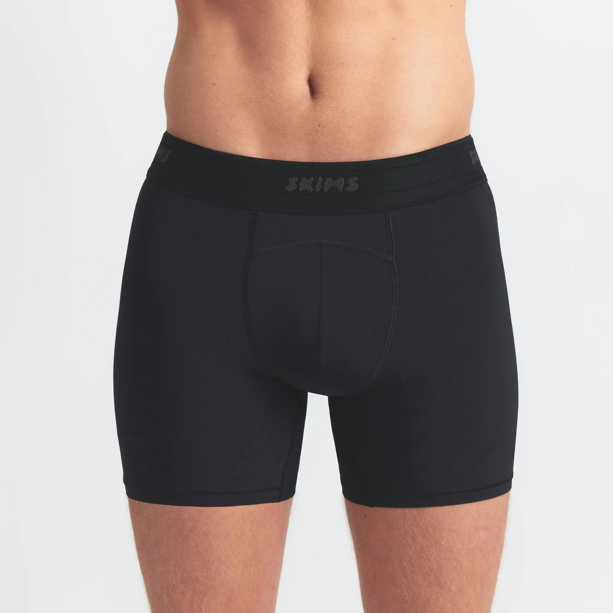 SKIMS FLEX MENS 5" BOXER BRIEF 3-PACK | TINT MULTI ON A MODEL SIDE VIEW