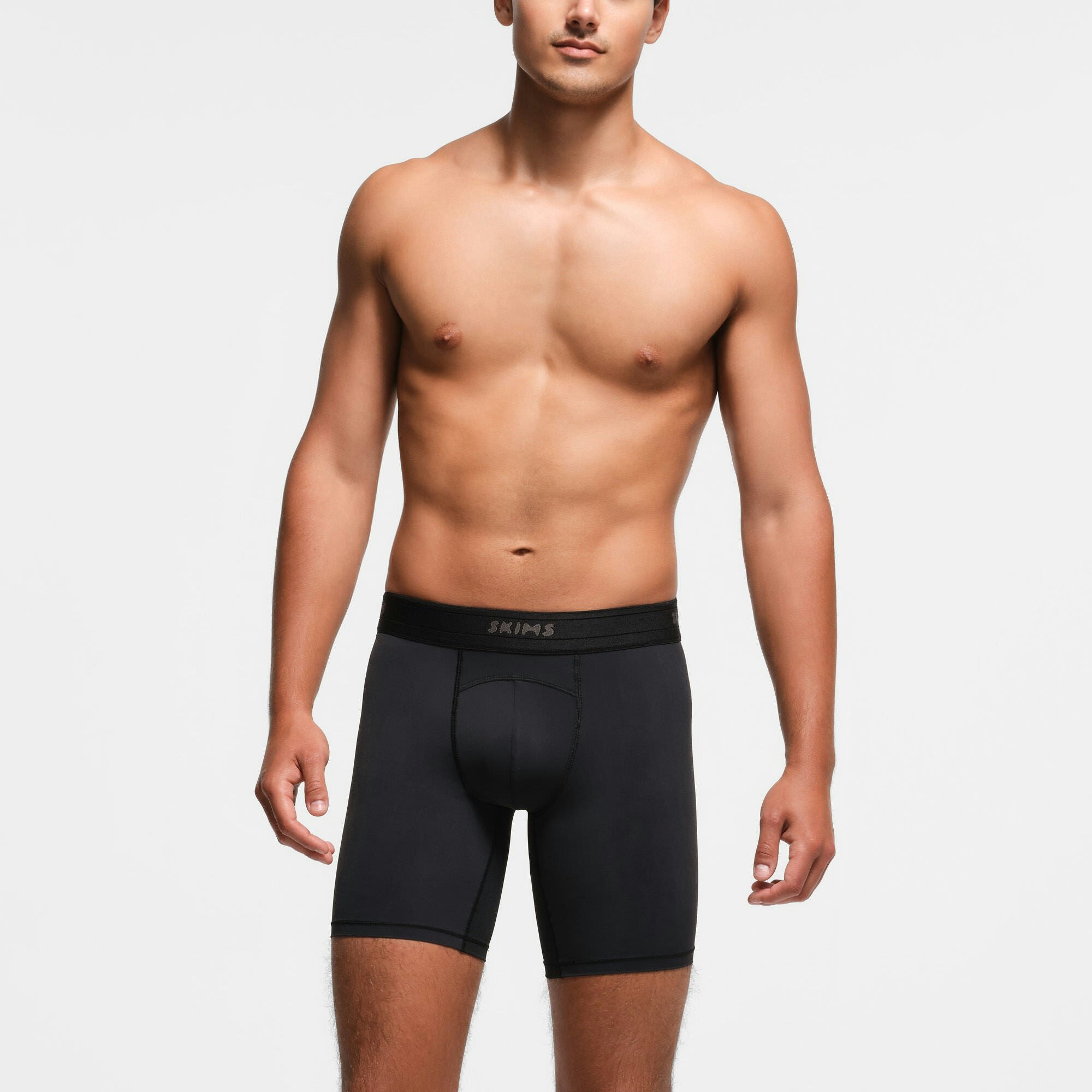 SKIMS SPORT MENS 7" BOXER BRIEF 3-PACK | OBSIDIAN MULTI ON A MODEL FRONT VIEW