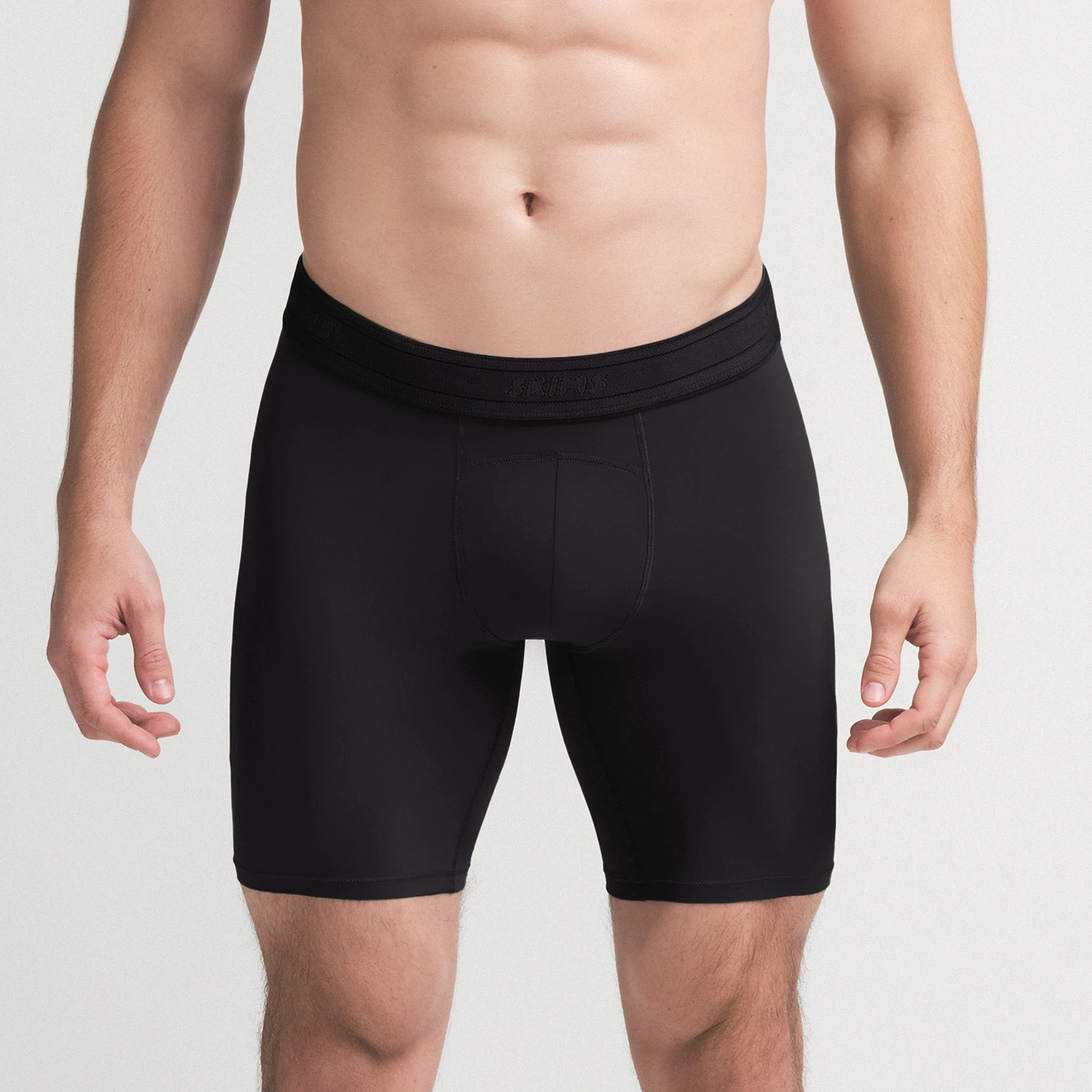 SKIMS SPORT MENS 7" BOXER BRIEF 3-PACK | SANGRIA MULTI ON A MODEL SIDE VIEW | FOCUS: 0.0, 1.0, 0.9