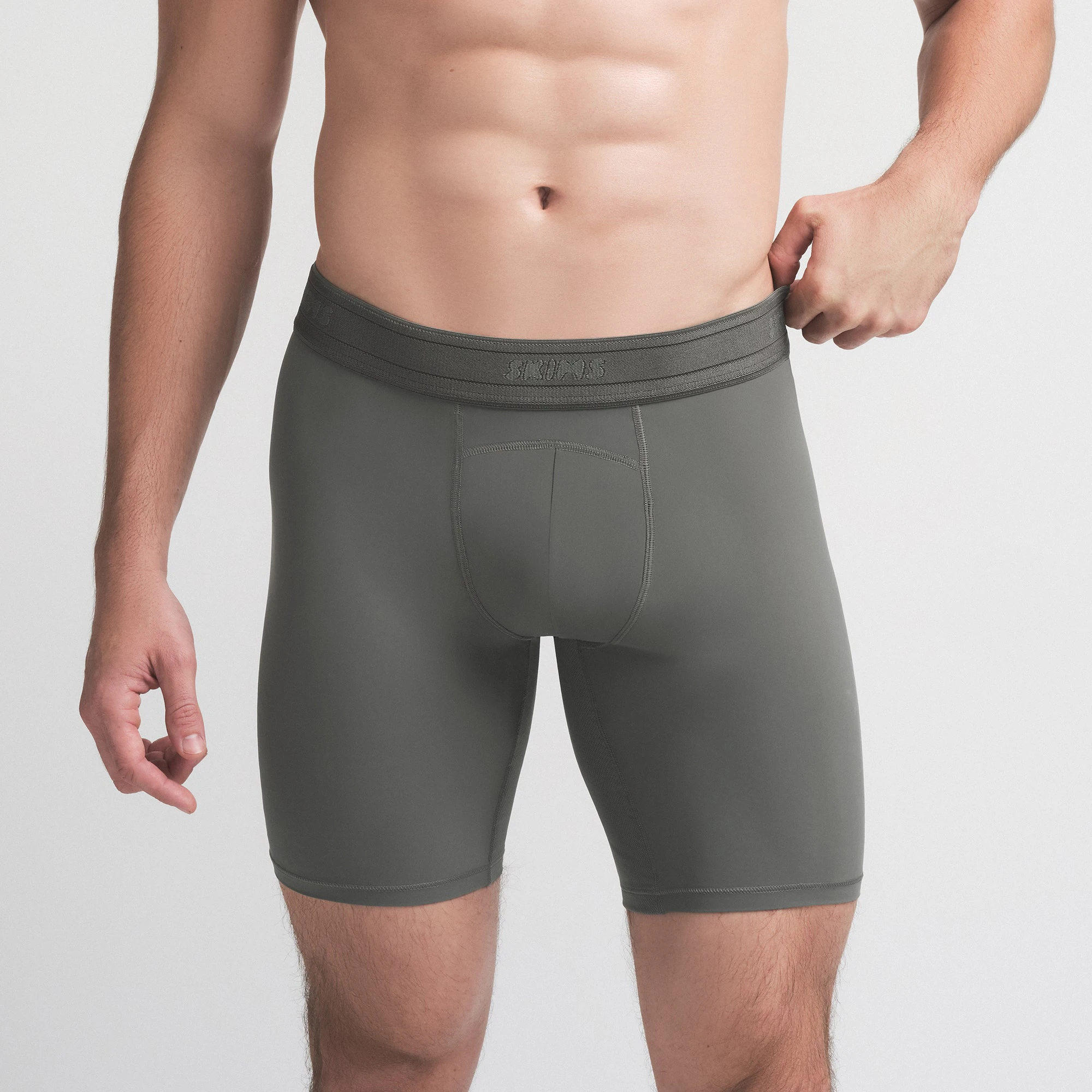 SKIMS SPORT MENS 7" BOXER BRIEF 3-PACK | SANGRIA MULTI ON A MODEL SIDE VIEW | FOCUS: 0.0, 1.0, 0.9