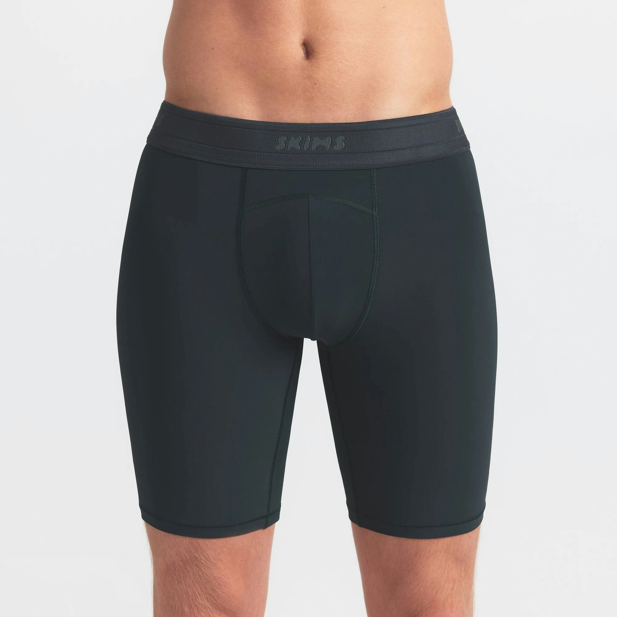 SKIMS FLEX MENS 7" BOXER BRIEF 3-PACK | TINT MULTI ON A MODEL SIDE VIEW