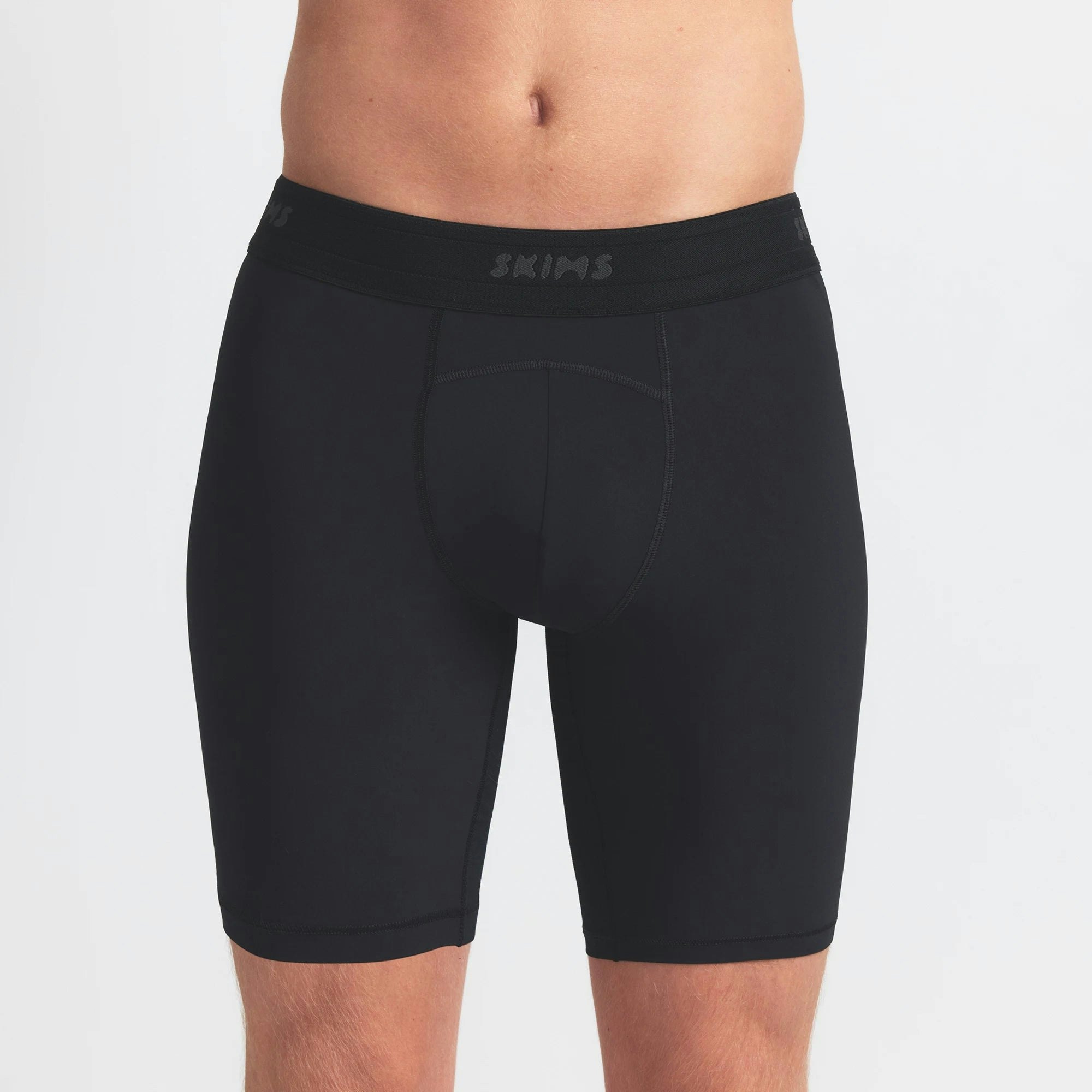 SKIMS FLEX MENS 7" BOXER BRIEF 3-PACK | TINT MULTI ON A MODEL SIDE VIEW