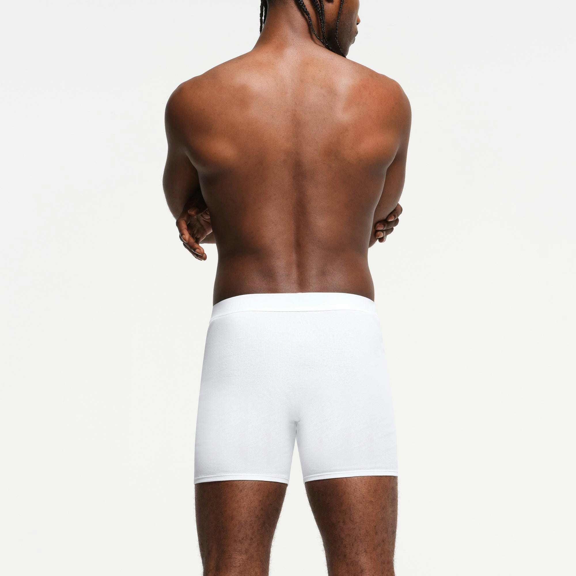 SKIMS BASICS MENS 100% COTTON BOXER BRIEF 3-PACK | CHALK ON A MODEL BACK VIEW