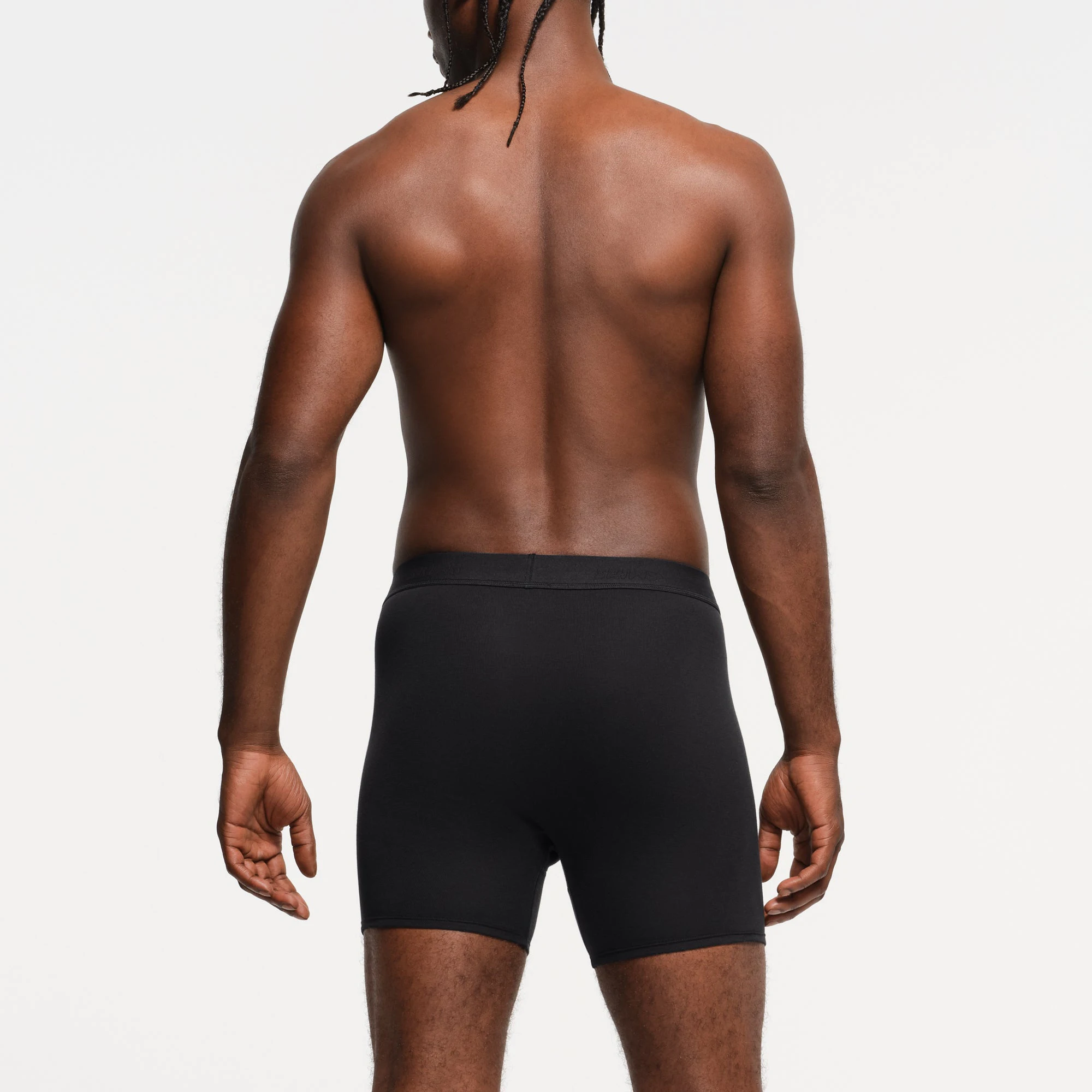 SKIMS BASICS MENS 100% COTTON BOXER BRIEF 3-PACK | OBSIDIAN ON A MODEL BACK VIEW