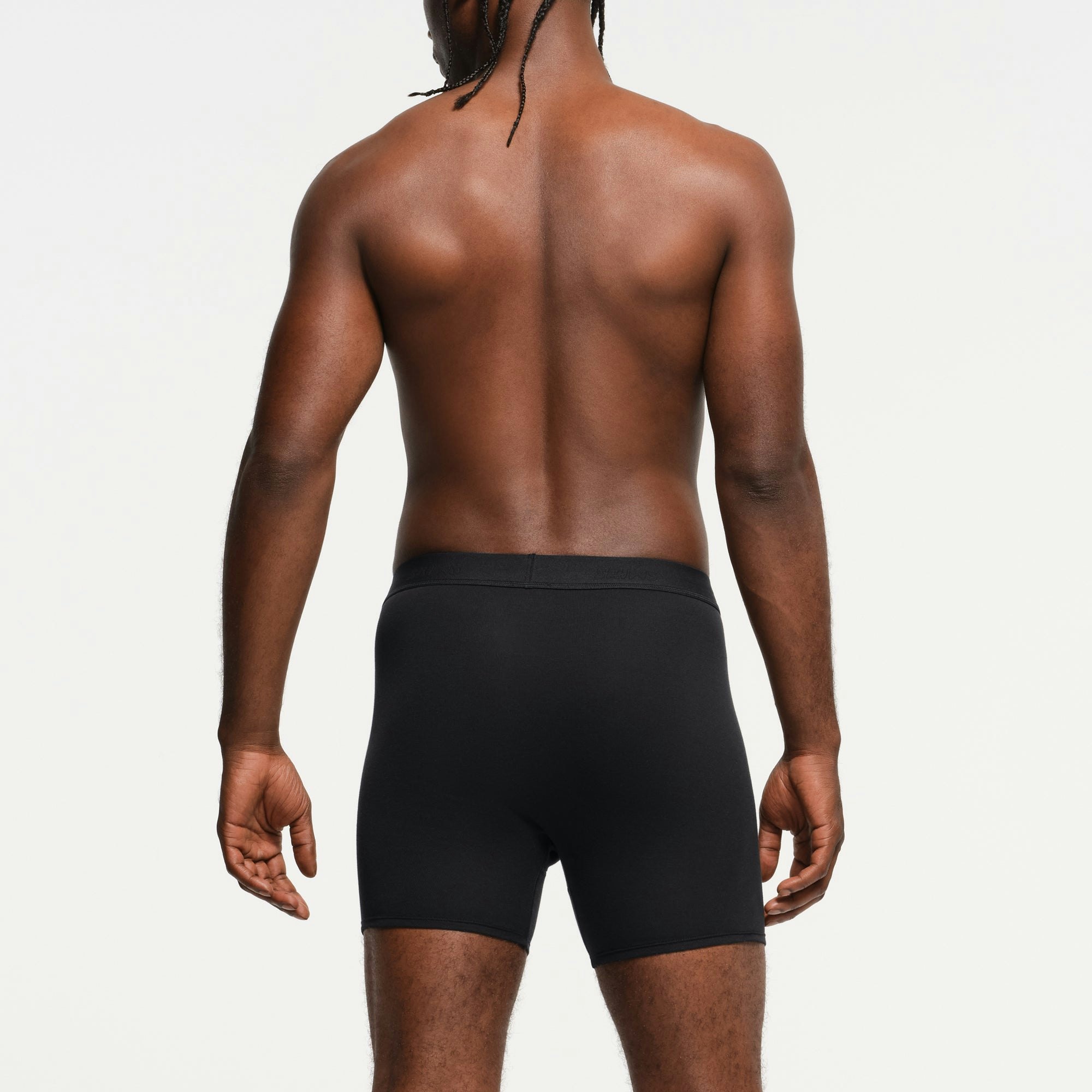 SKIMS BASICS MENS 100% COTTON BOXER BRIEF 3-PACK | OBSIDIAN ON A MODEL BACK VIEW