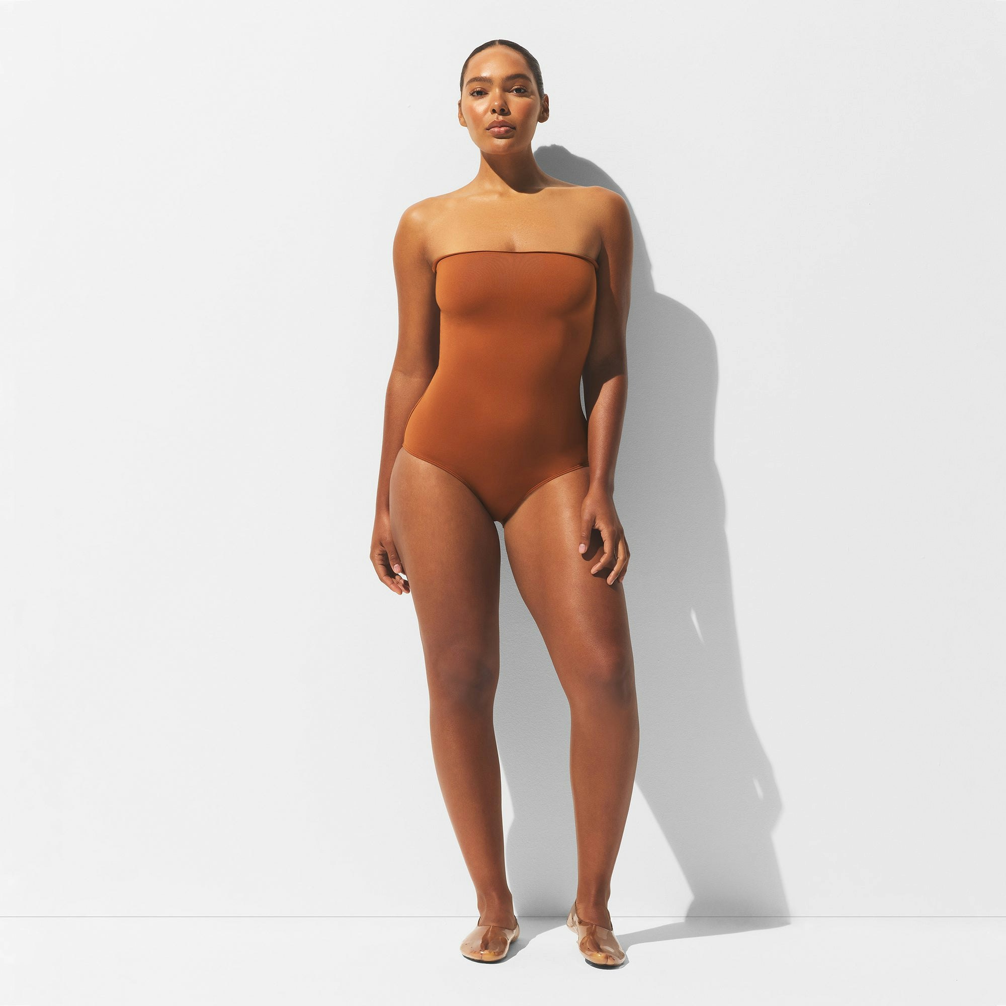 MINIMAL SWIM CONVERTIBLE BIKINI BOTTOM | BRONZE ON A MODEL FRONT VIEW | FOCUS: 0.0, 1.0, 0.9
