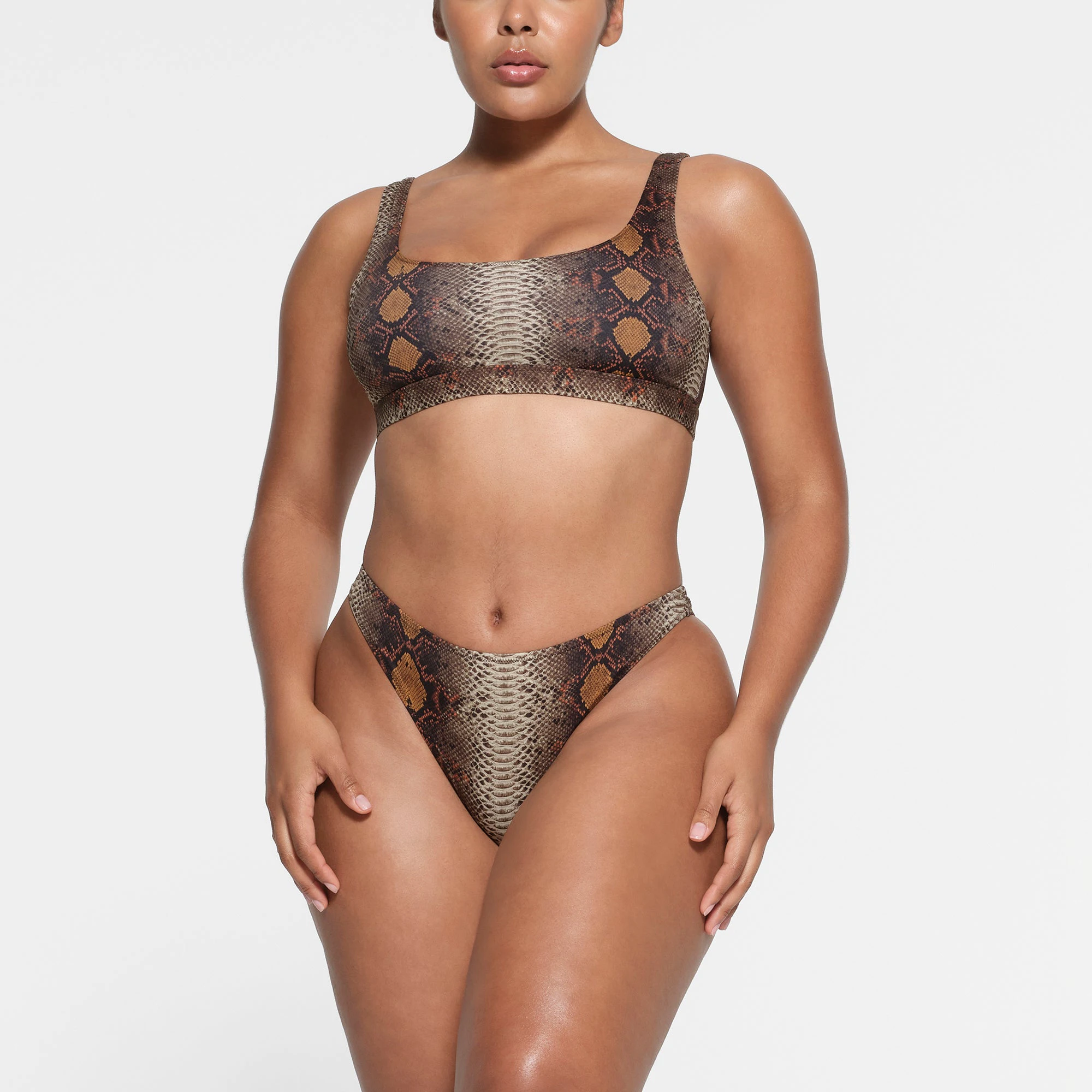 SIGNATURE SWIM MID COVERAGE BOTTOM | DESERT SNAKE PRINT ON A MODEL FRONT VIEW